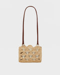 Sac Nano 1969 en raphia naturel, orné de pastilles signature 1969 en métal doré clair
