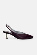 Kitten heel pumps in black leather with silver jeweled heel