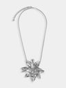 Necklace with silver metal flower pendant