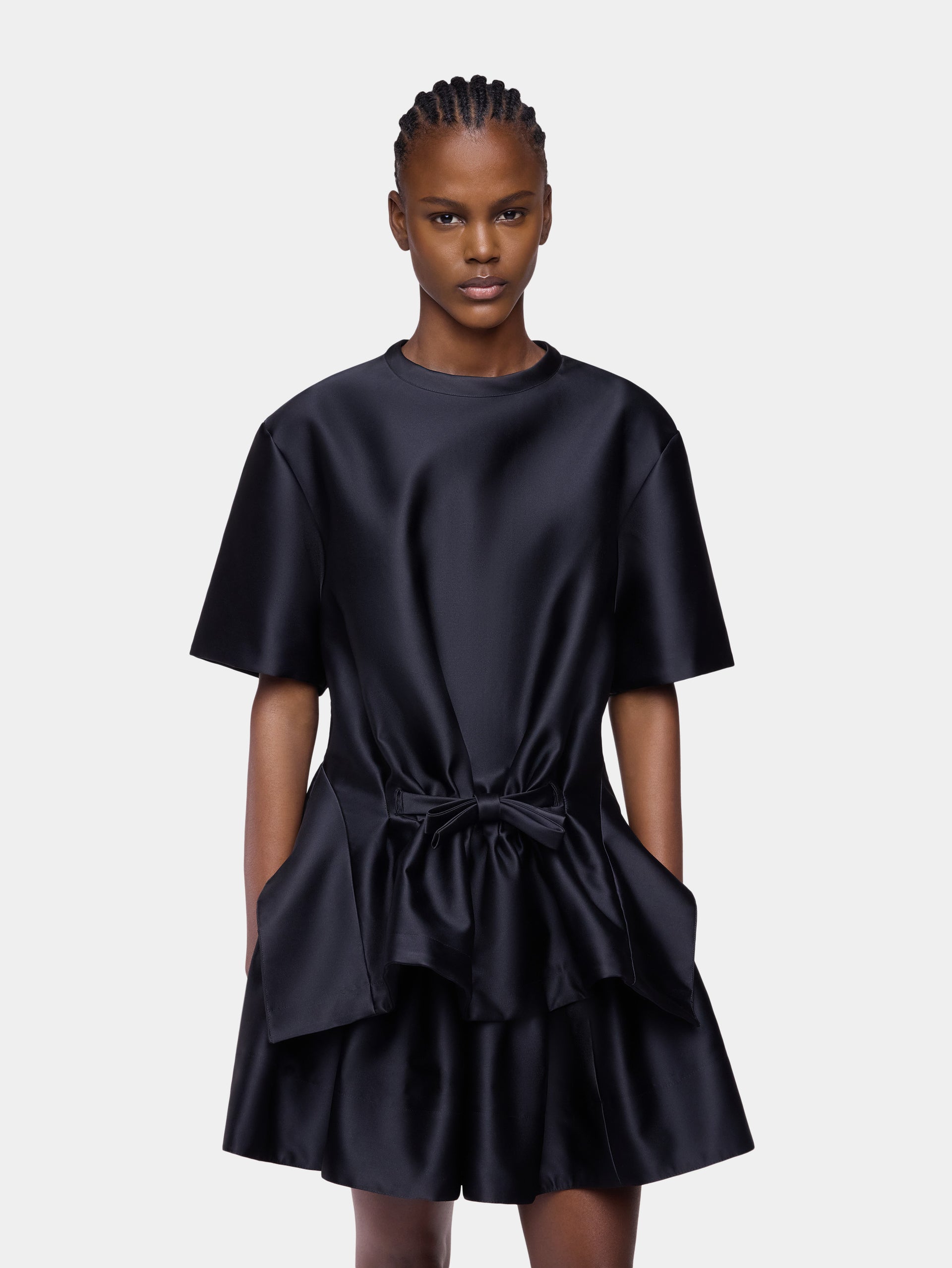 Tailored top in black satin with bow detail position 1