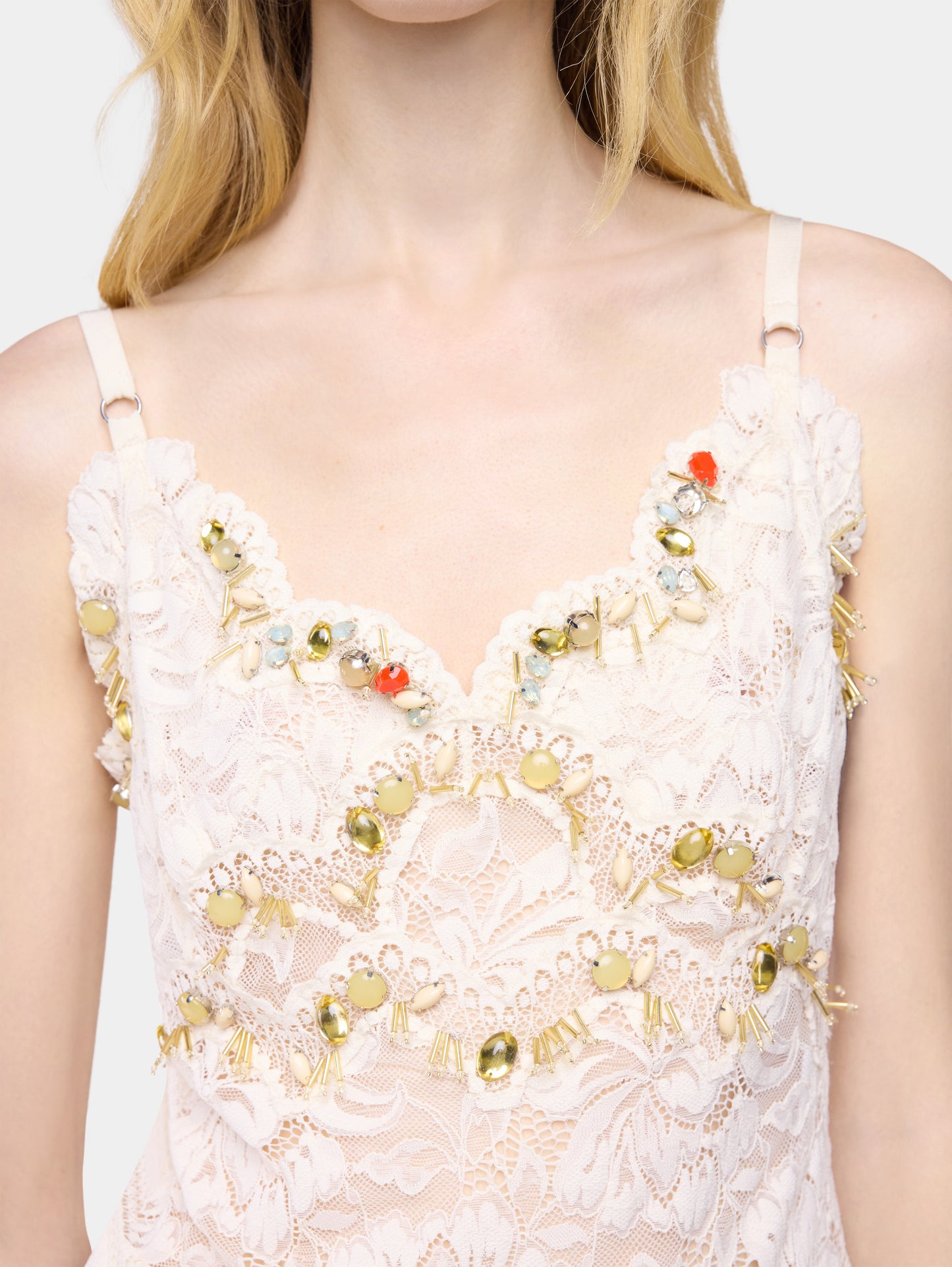 Sleeveless top in off white hand embroidered lace