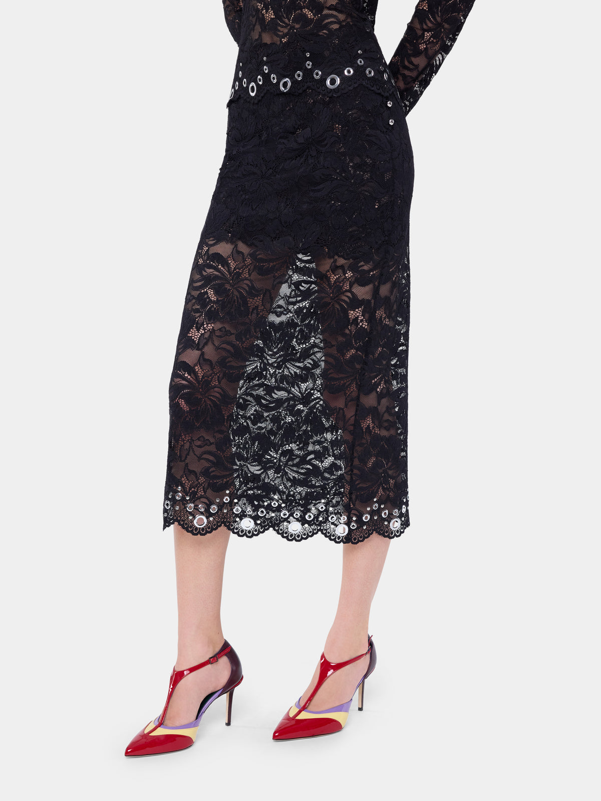Midi skirt in black layered lace embellished with silver eyelets