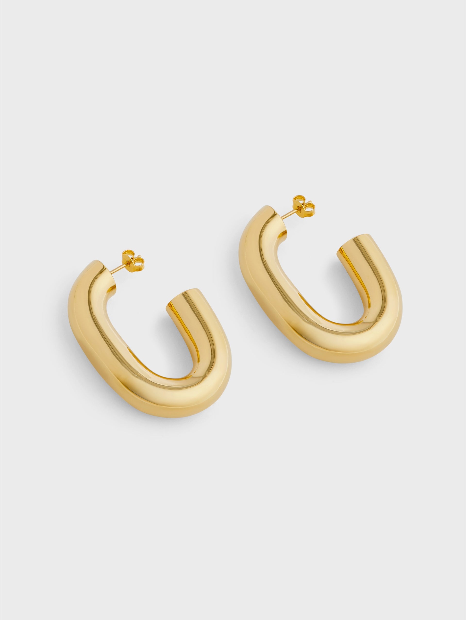 Gold XL link earrings position 4