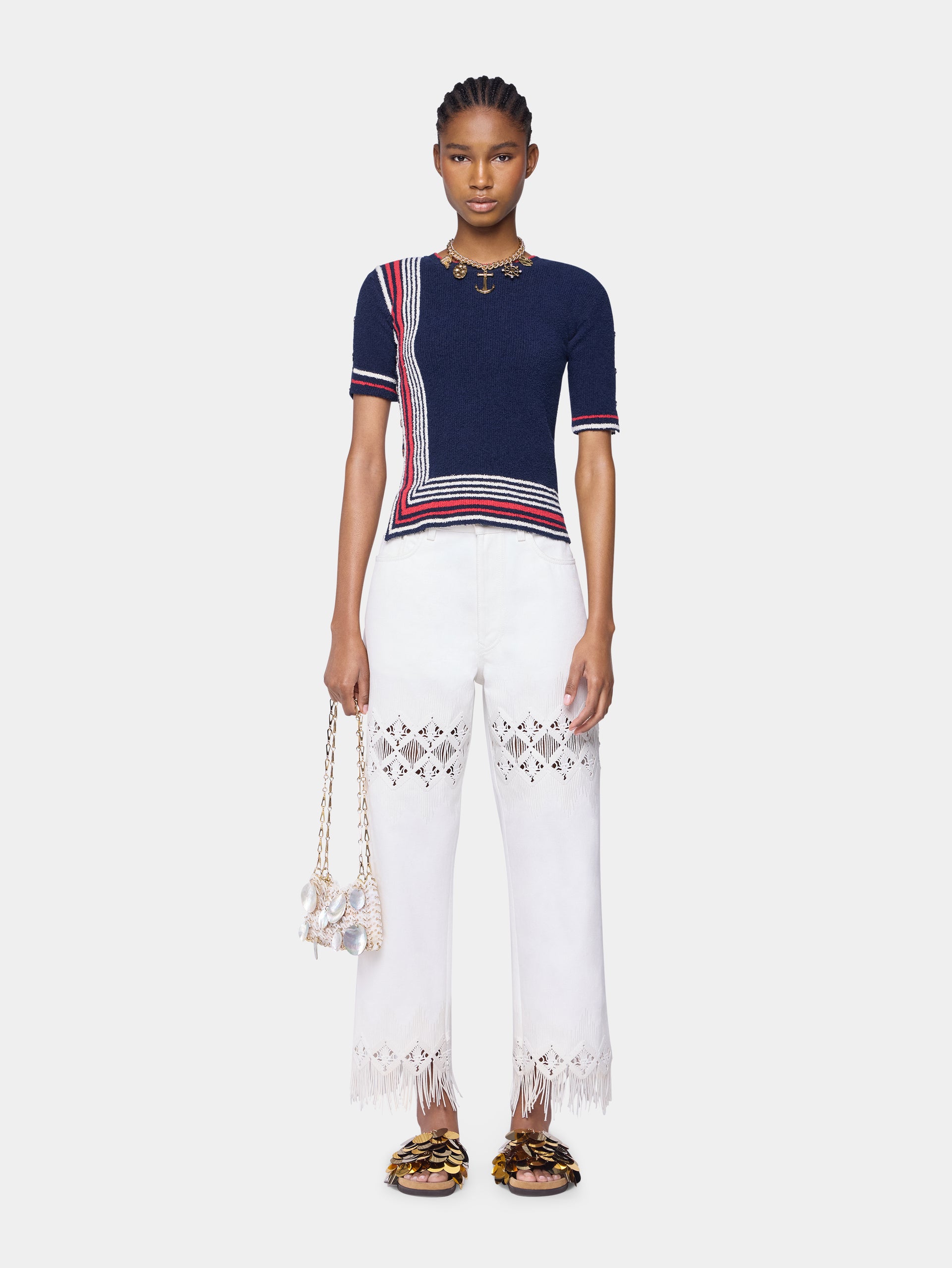 Trousers in denim with embroidery details position 2