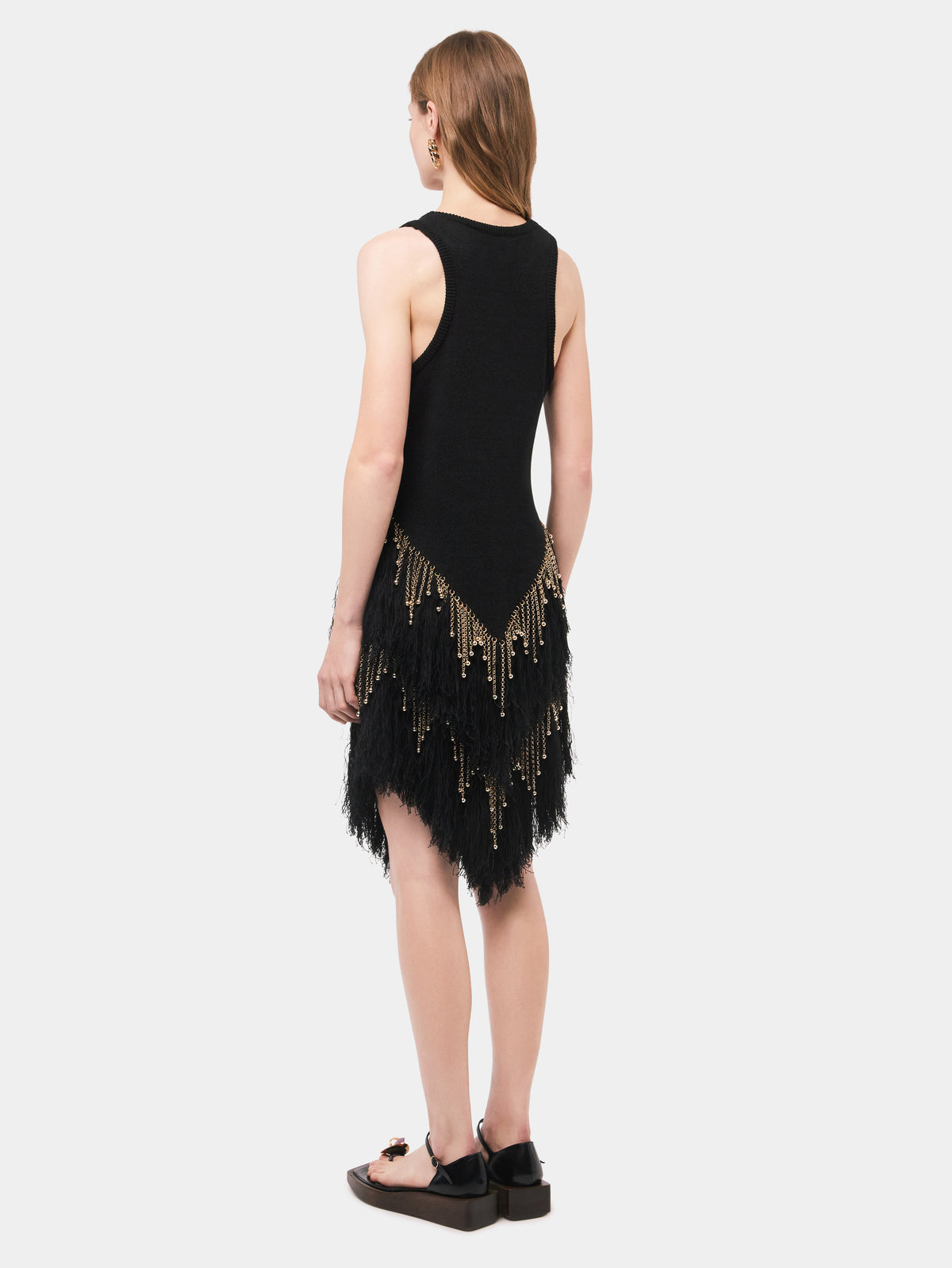 Black woven skirt with knitted beads and feathers