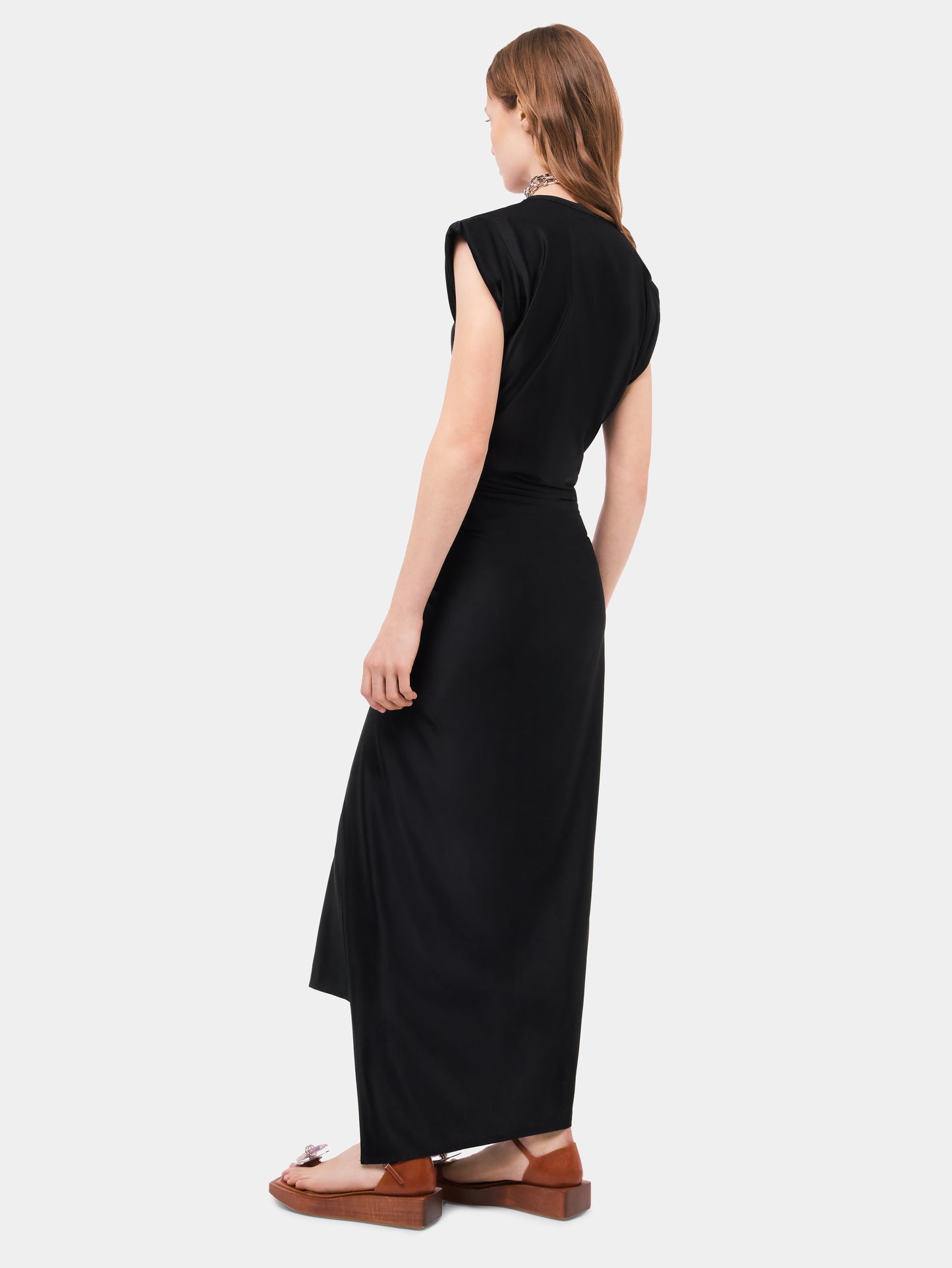 Black draped dress with signature piercing