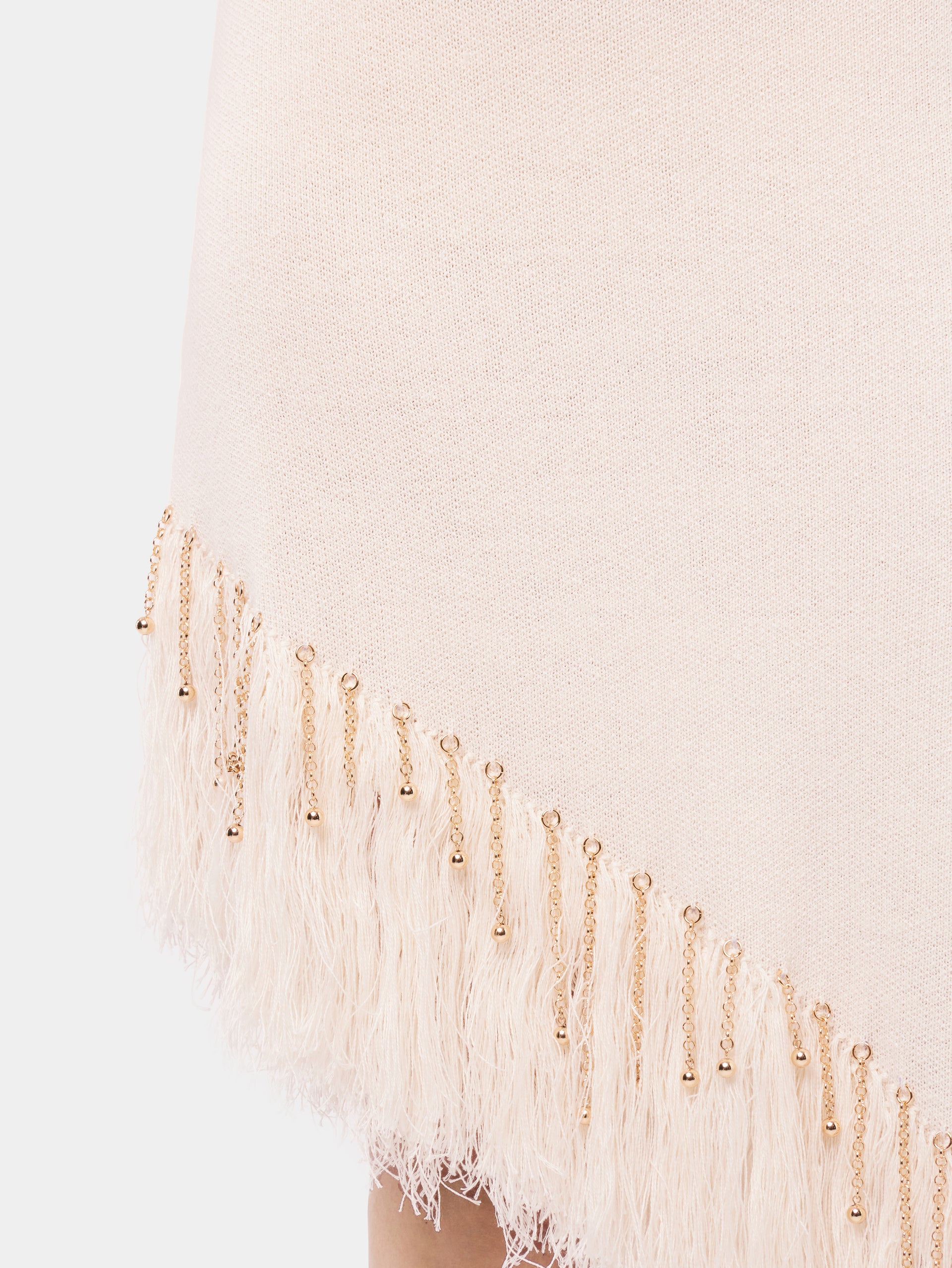Asymmetrical off white woven dress with knitted beads and feathers