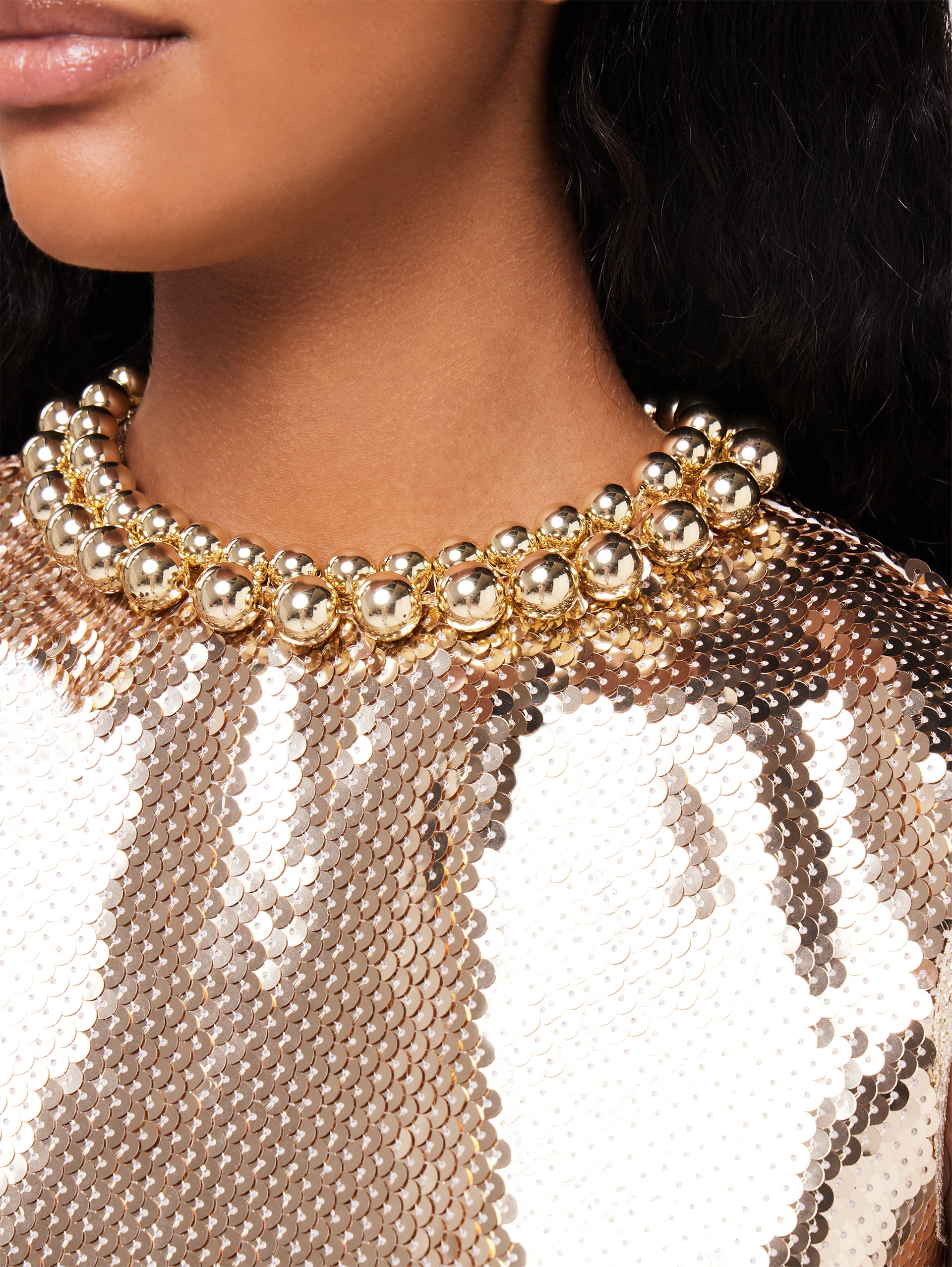 Crop top à sequins dorés