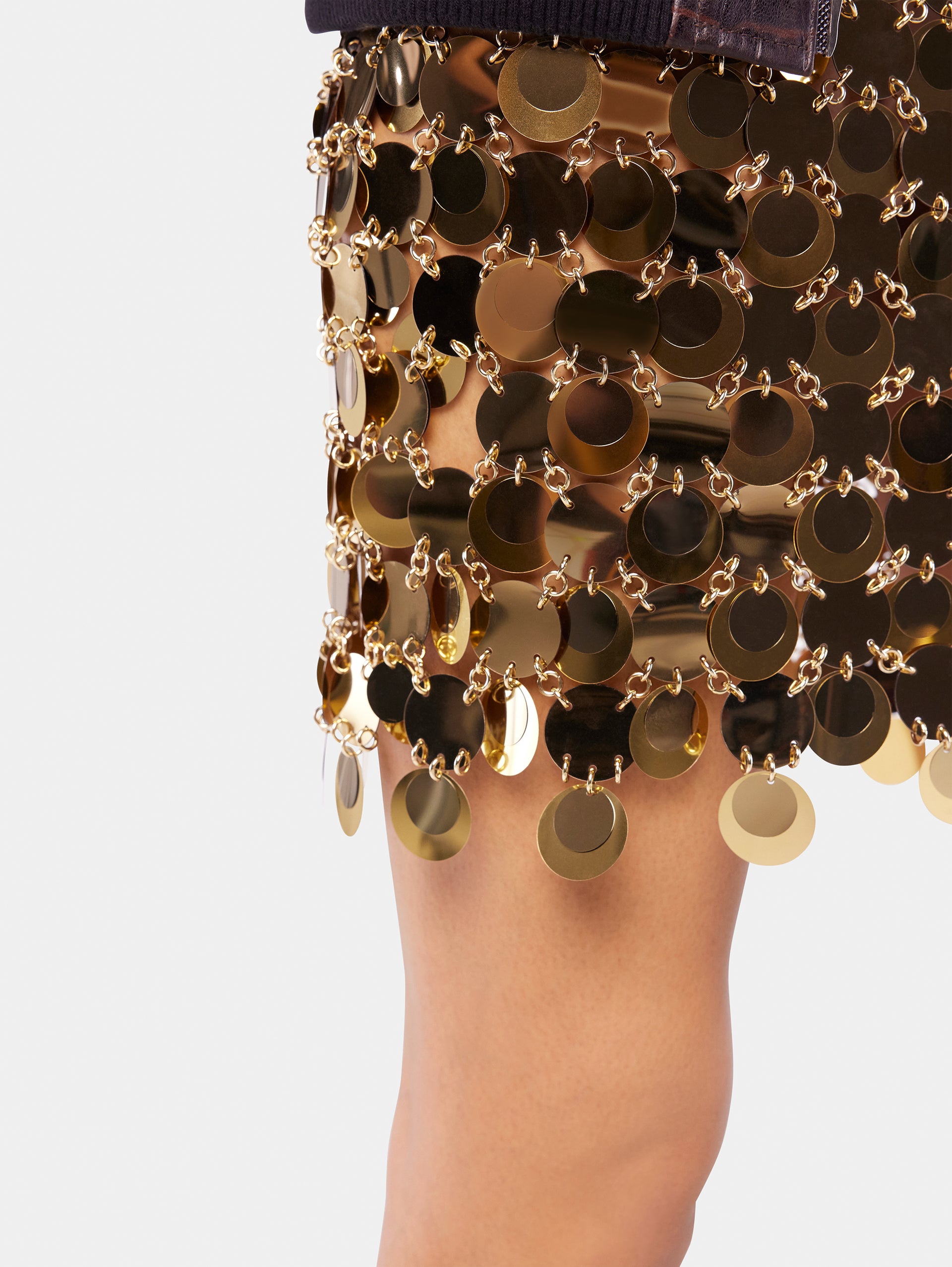 The gold sparkle discs skirt position 6