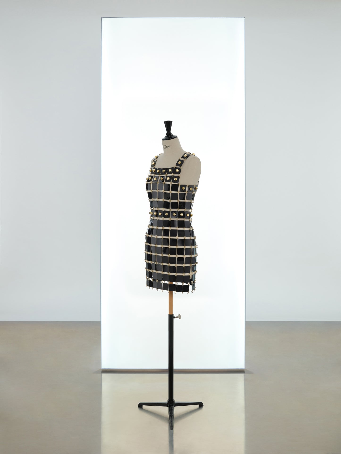 Short strap dress made in rhodoid assembly