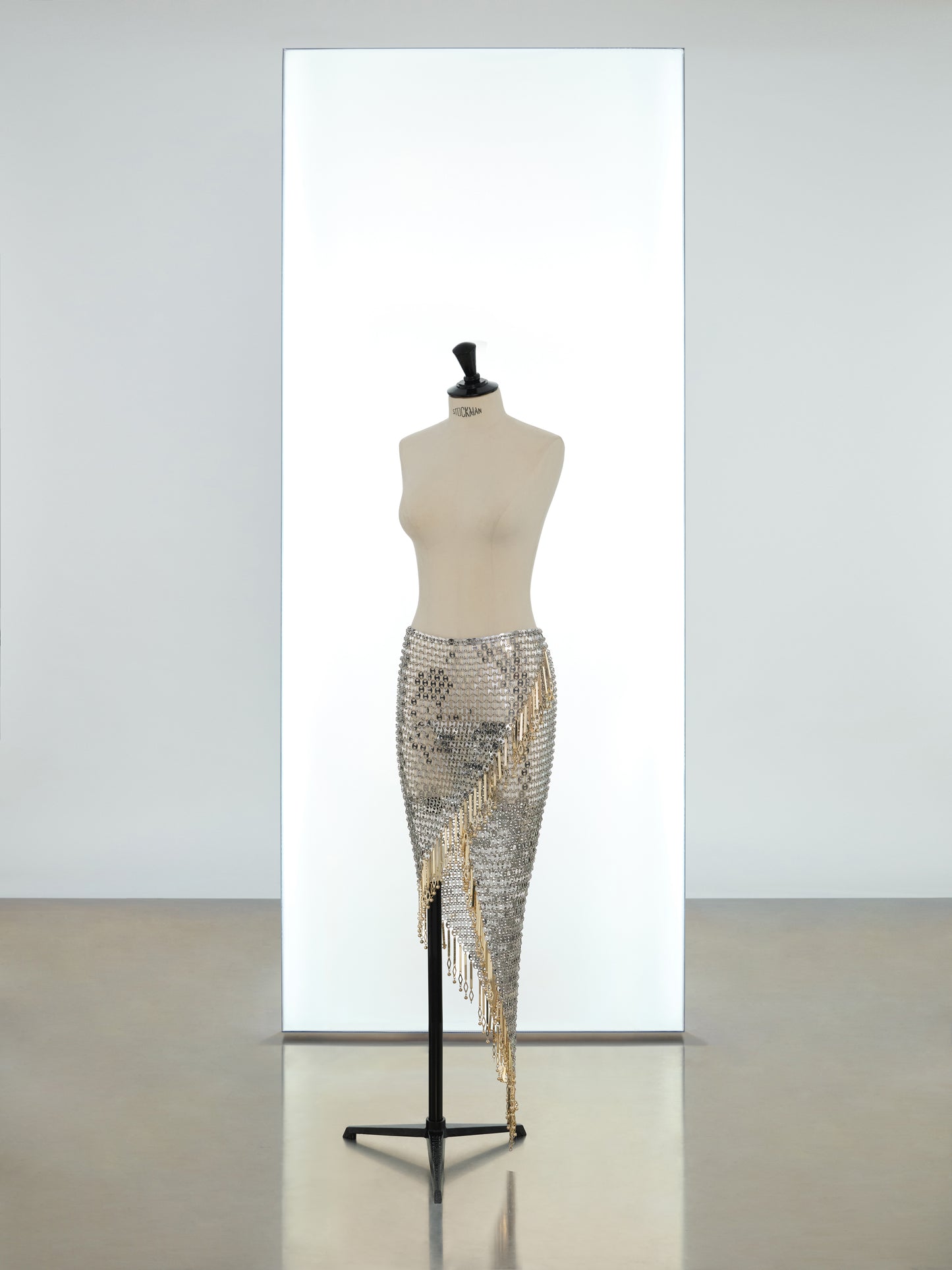 Mid length wrap skirt made in metallic eight assembly