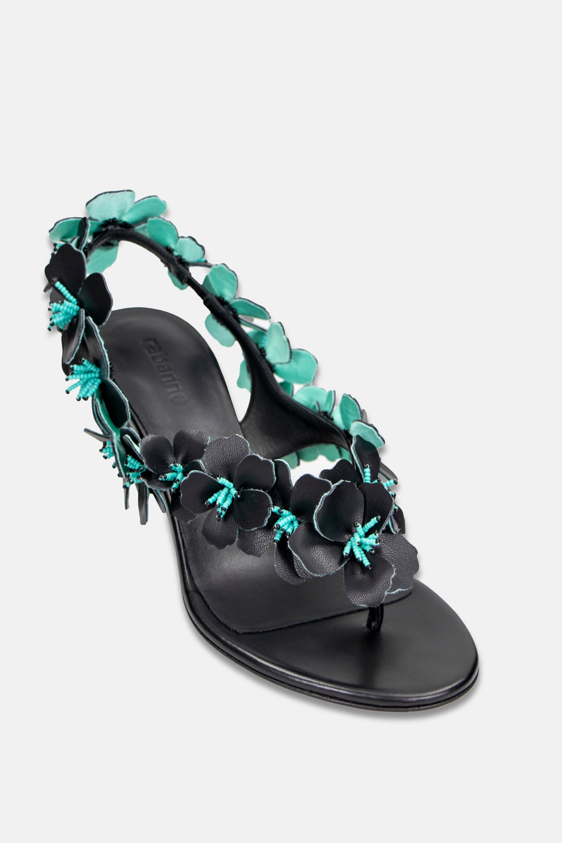 Kitten heel sandals in bi-color black and teal adorned with leather flowers position 2