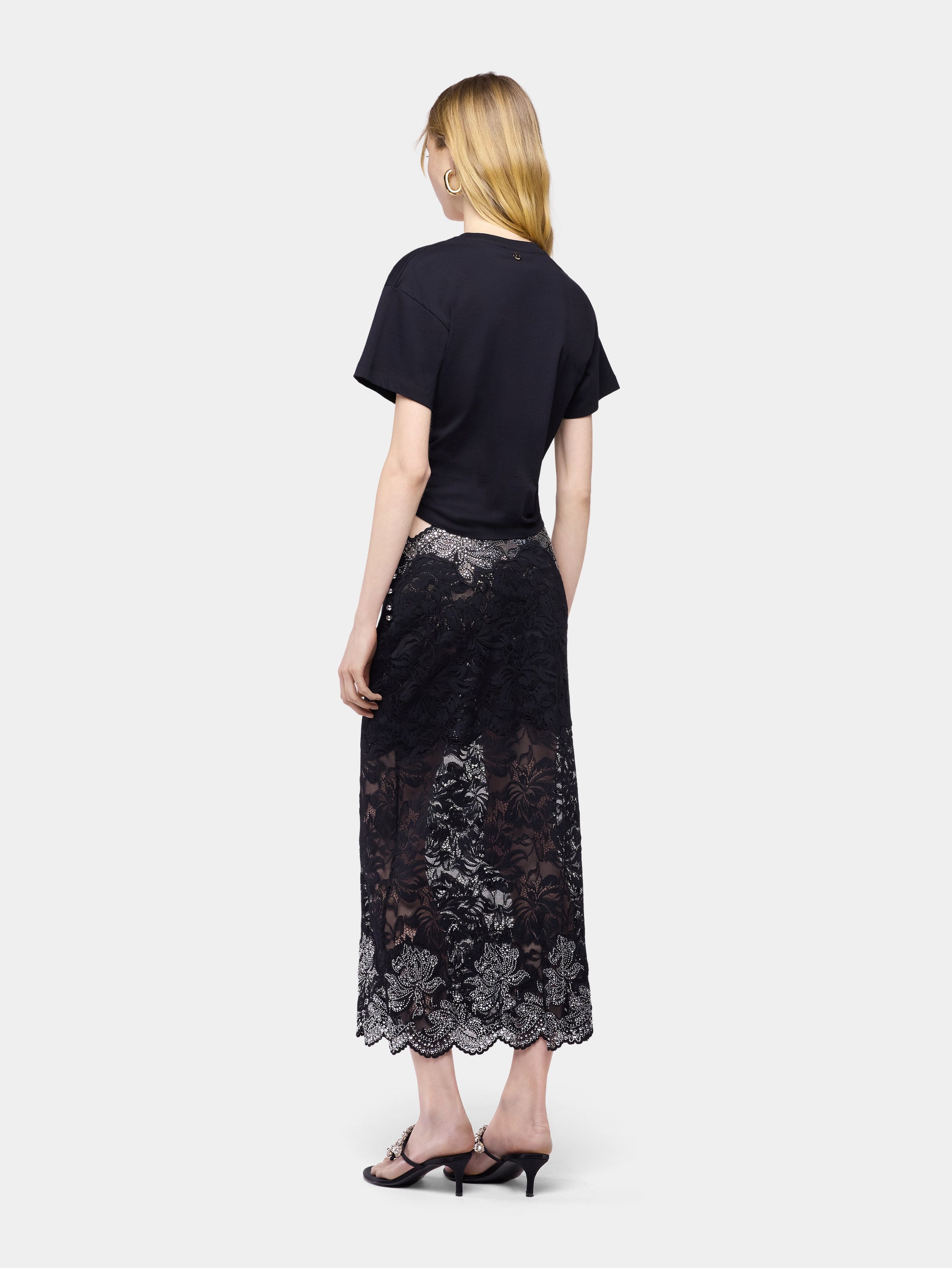 T-shirt en coton noir avec détail piercing signature