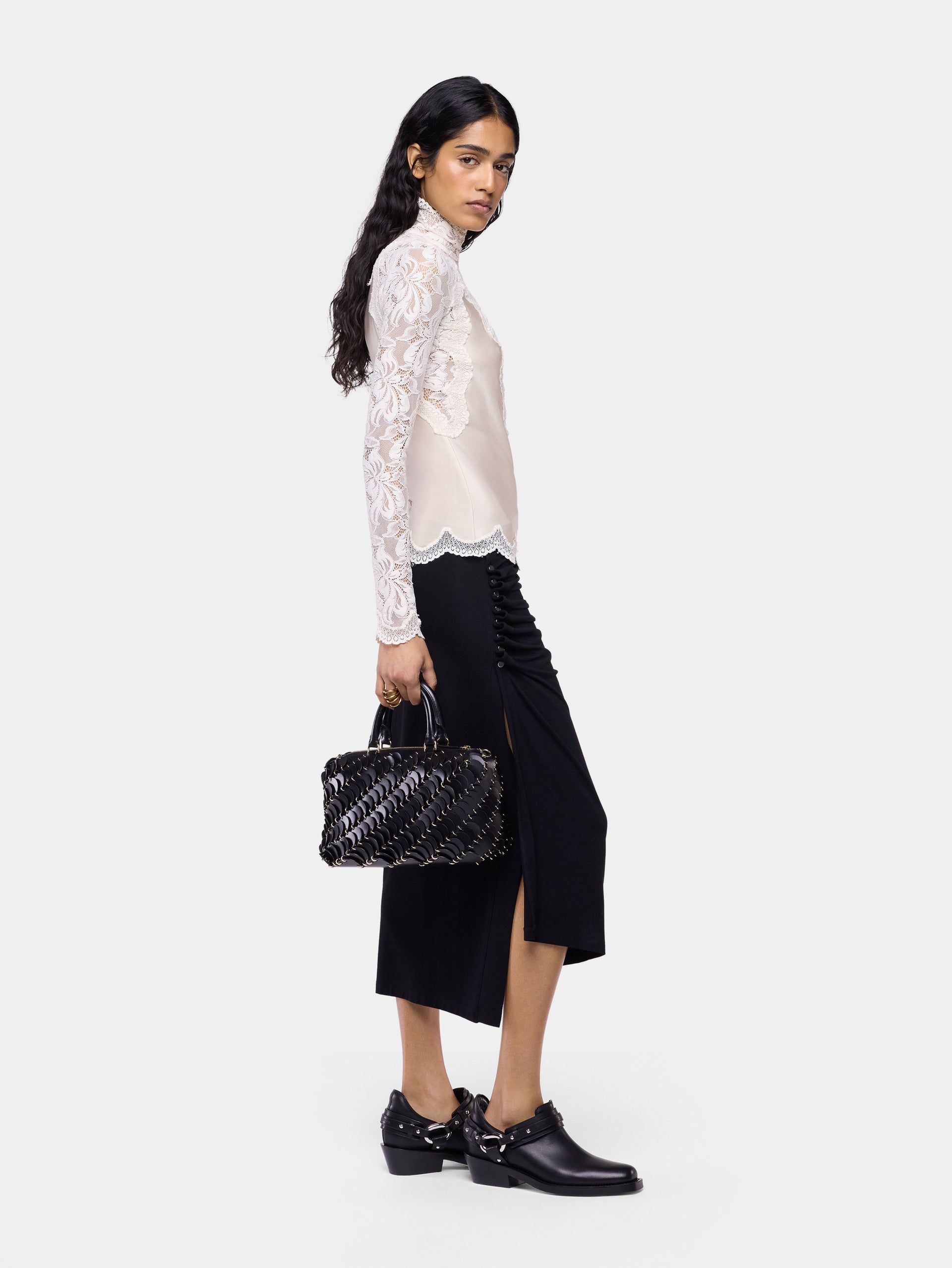 Jupe midi en jersey noir avec détails de drapé