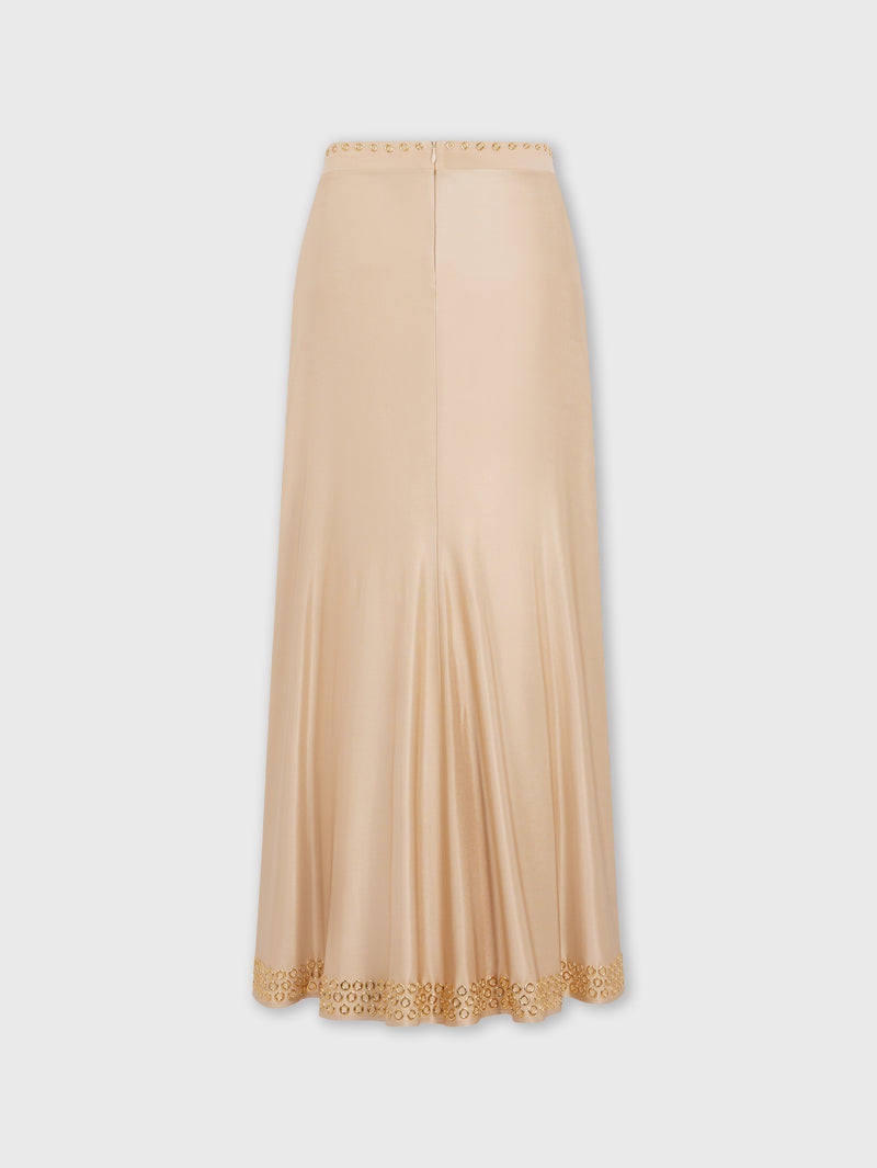 Long raffia colored skirt with embroidered metallic eyelets