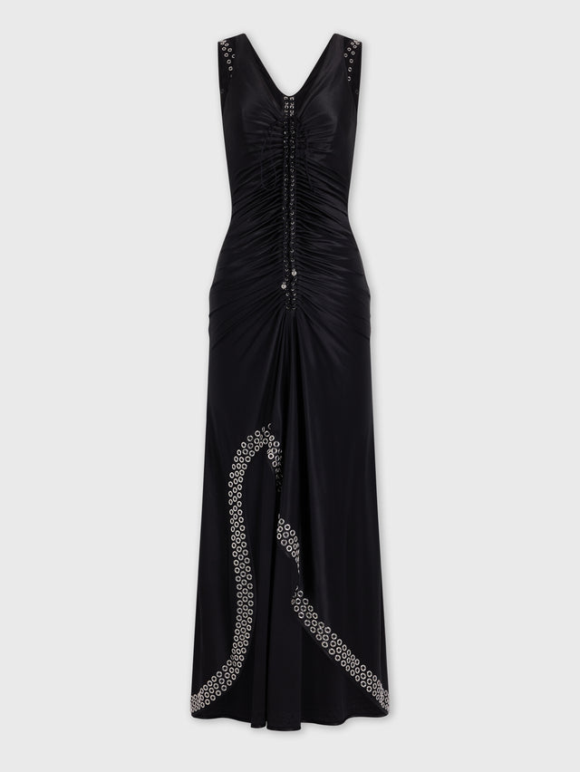 Long black dress with embroidered metallic eyelets
