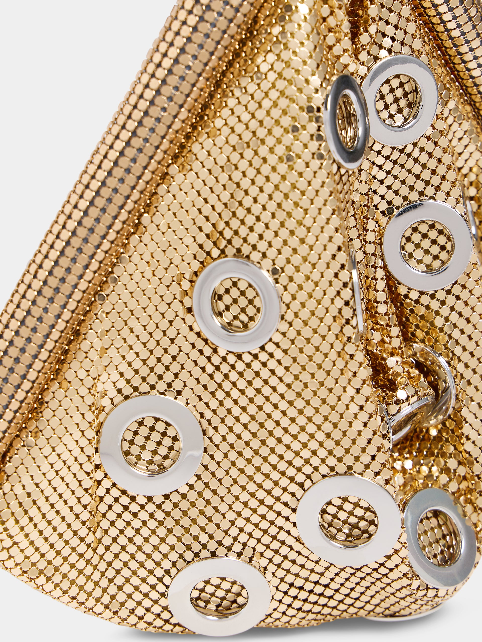 Golden chainmail clutch bag with metallic eyelets