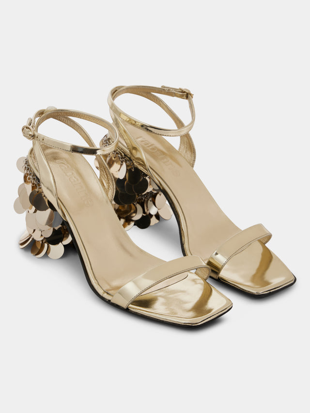 Gold sandals with sparkle discs heels
