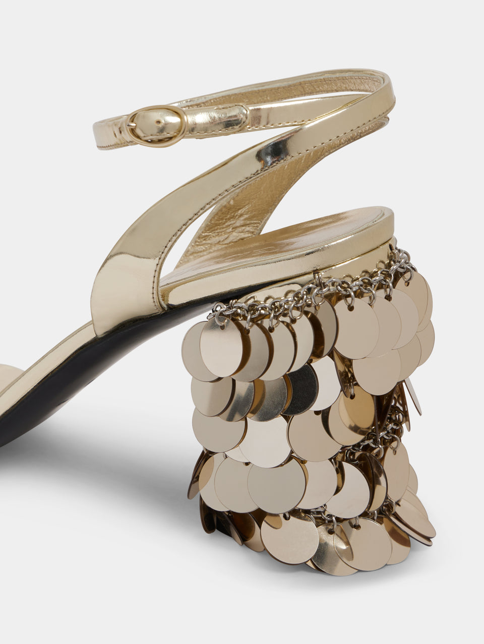 Gold sandals with sparkle discs heels