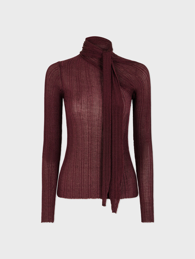 Long sleeved sweater with a tie-neck scarf