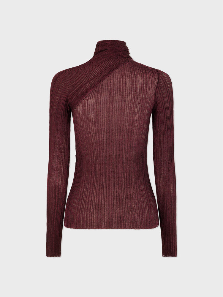 Long sleeved sweater with a tie-neck scarf