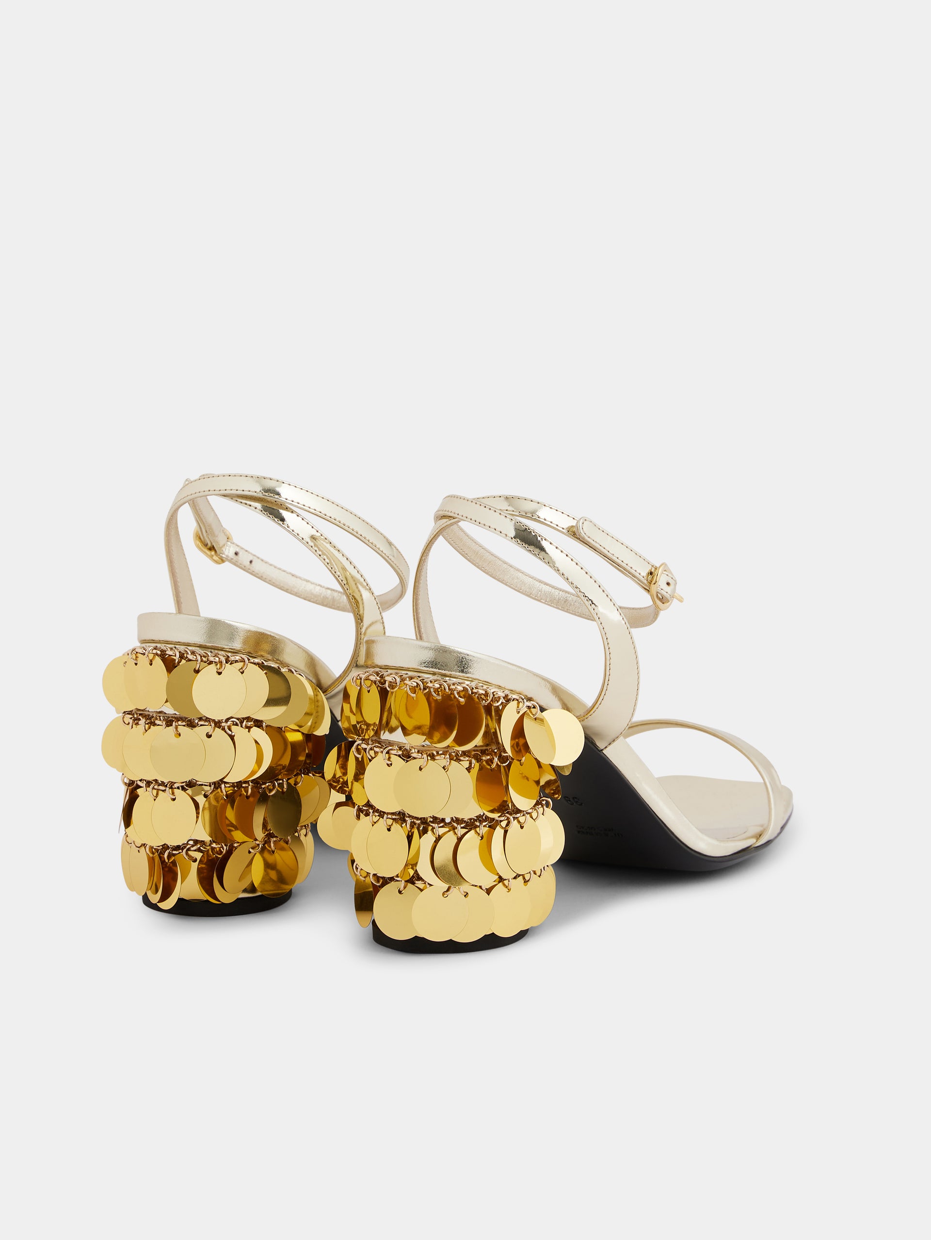 Gold sandals with sparkle discs heels