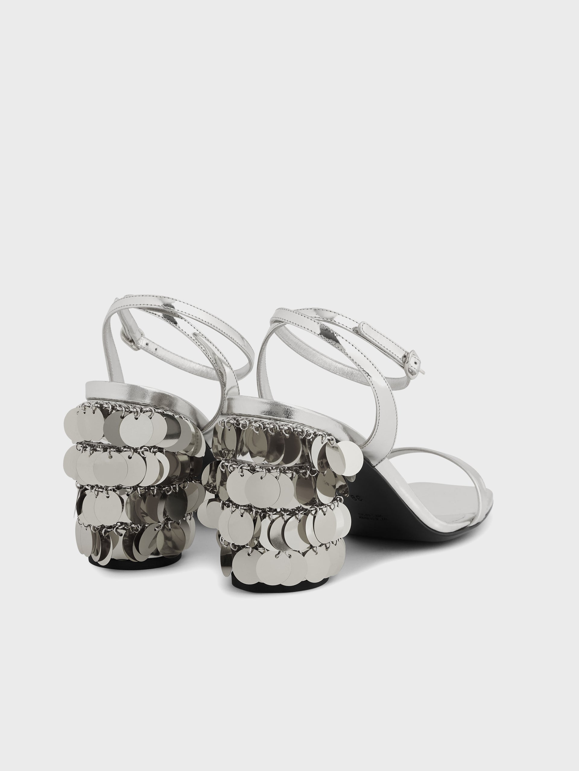 Silver sandals with sparkle discs heels