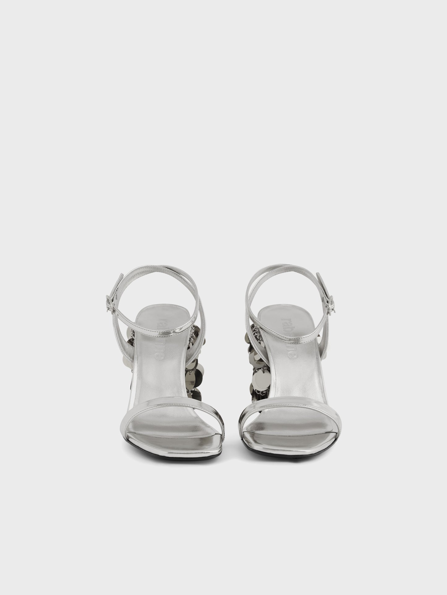 Silver sandals with sparkle discs heels