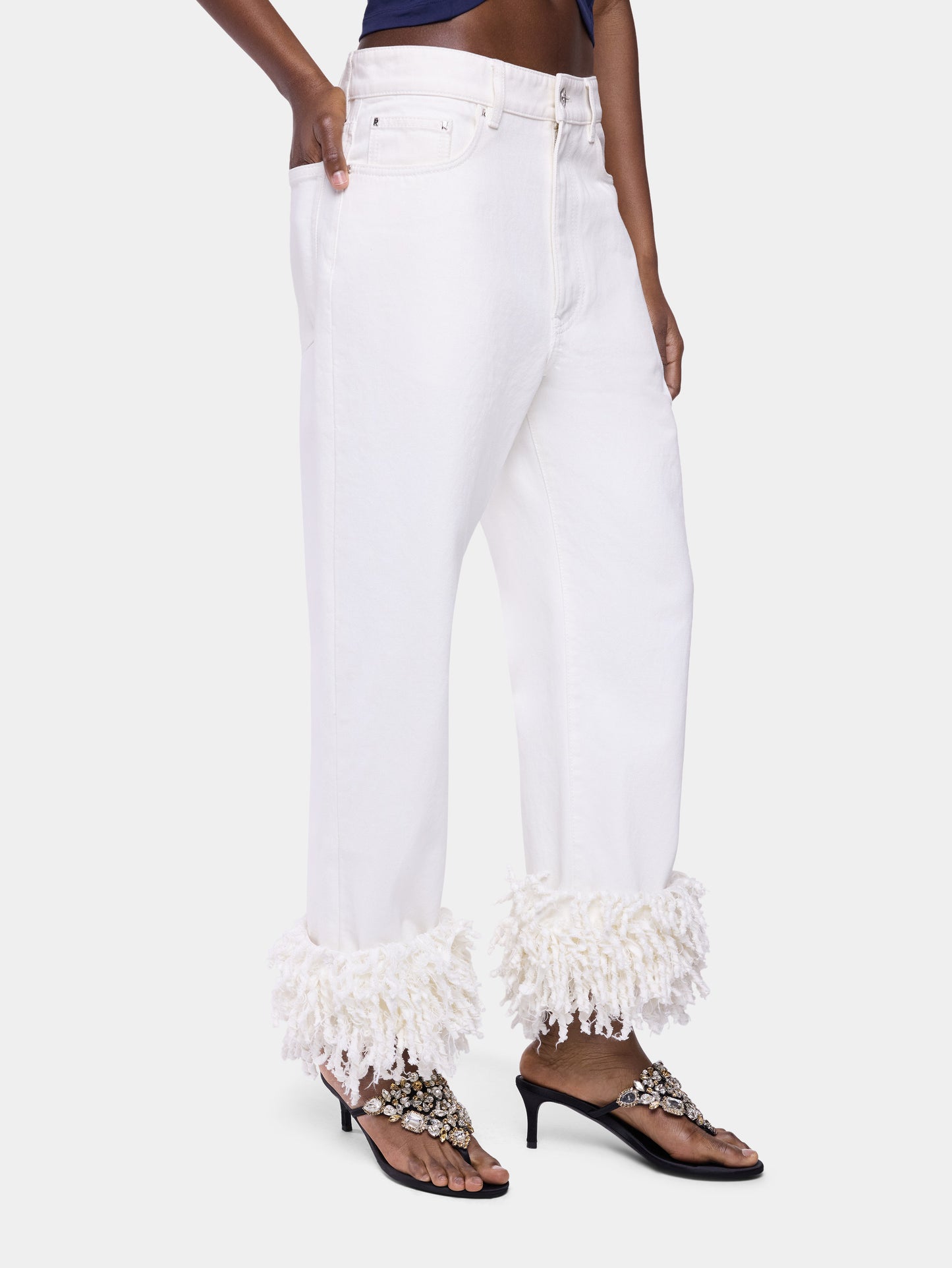 Jean baggy en denim blanc avec franges 
