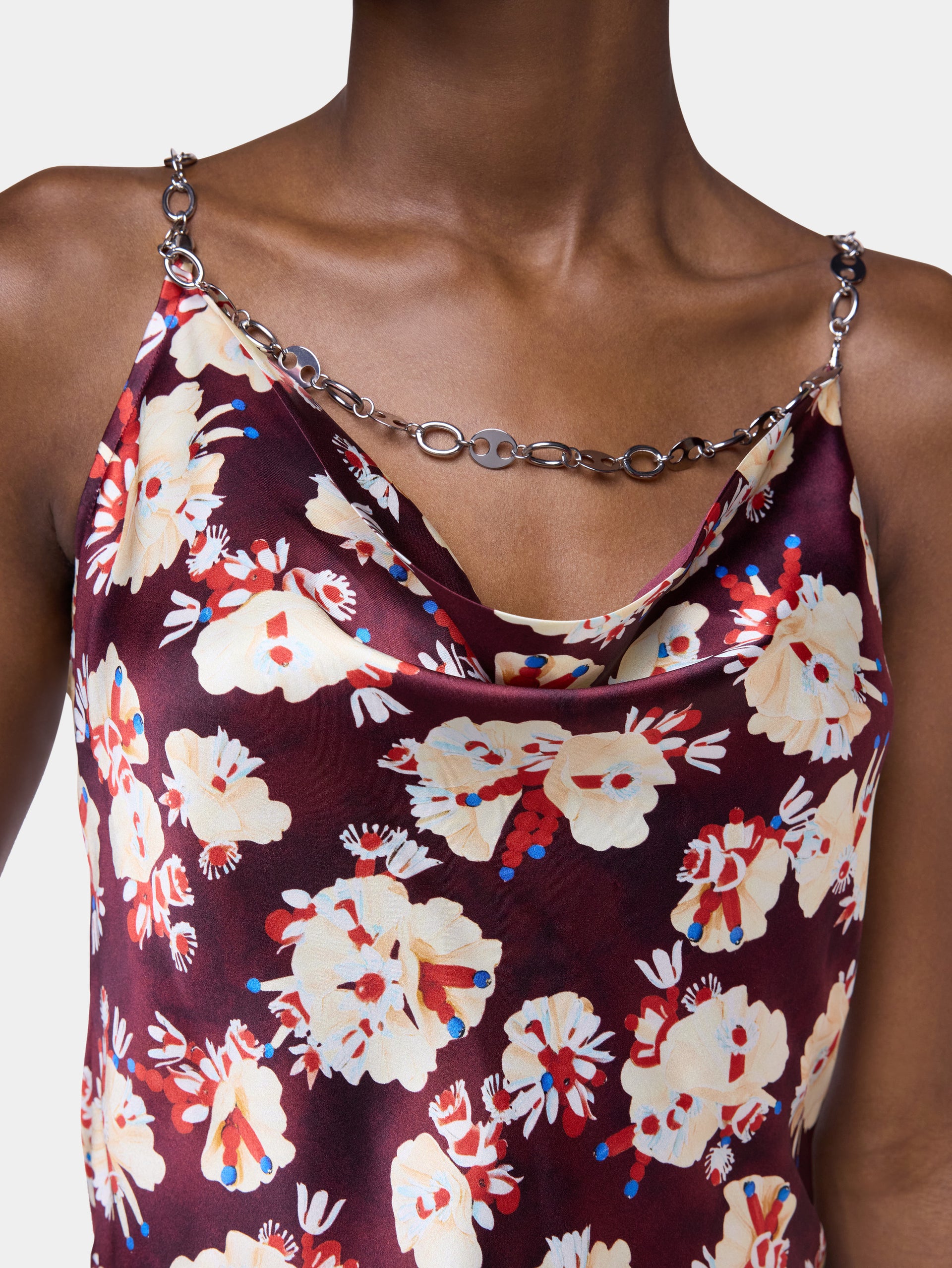 Top magenta à motif floral en satin de soie