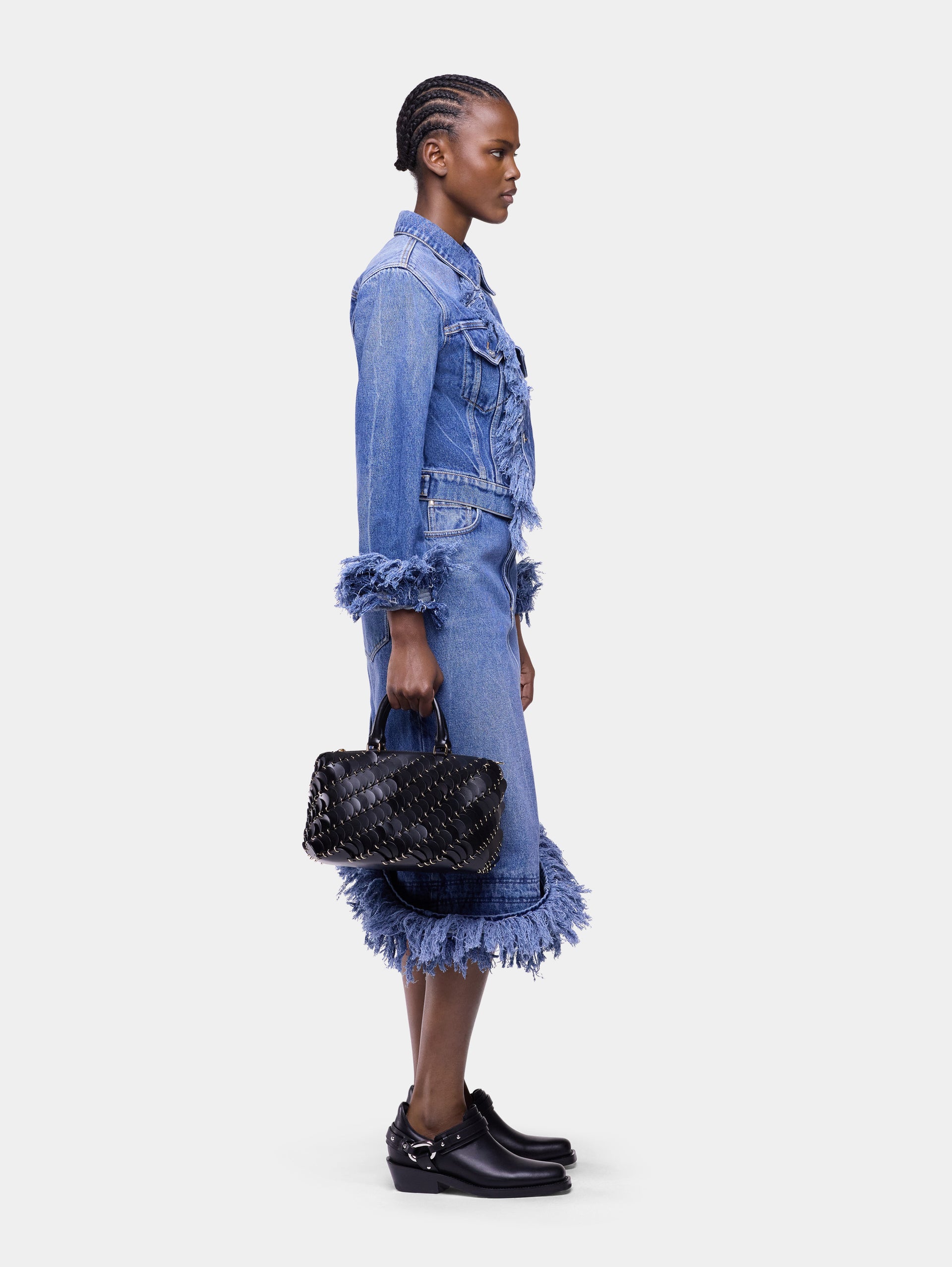 Fitted blue washed denim jacket with fringes