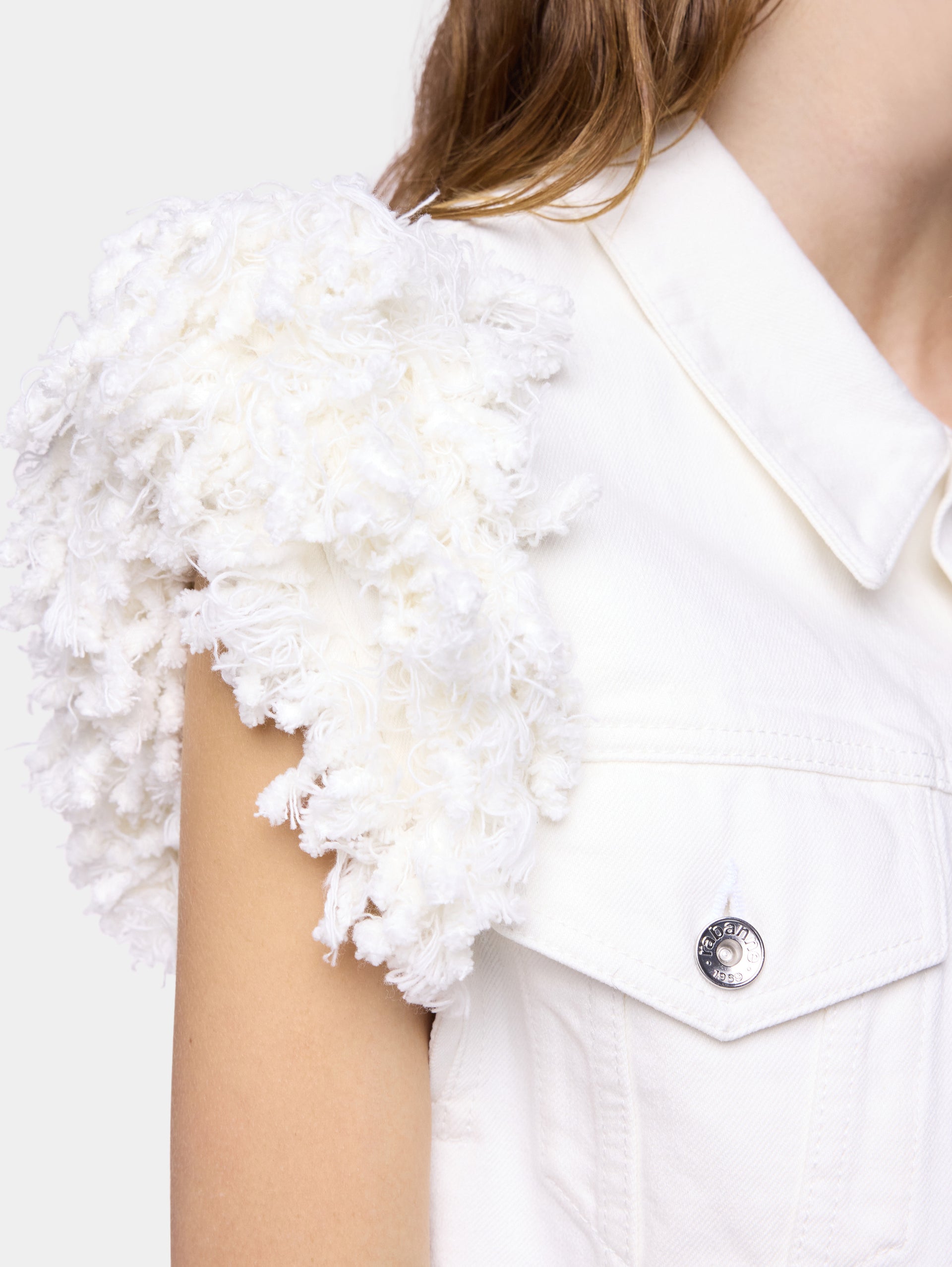 Veste en denim blanc ajustée avec franges 