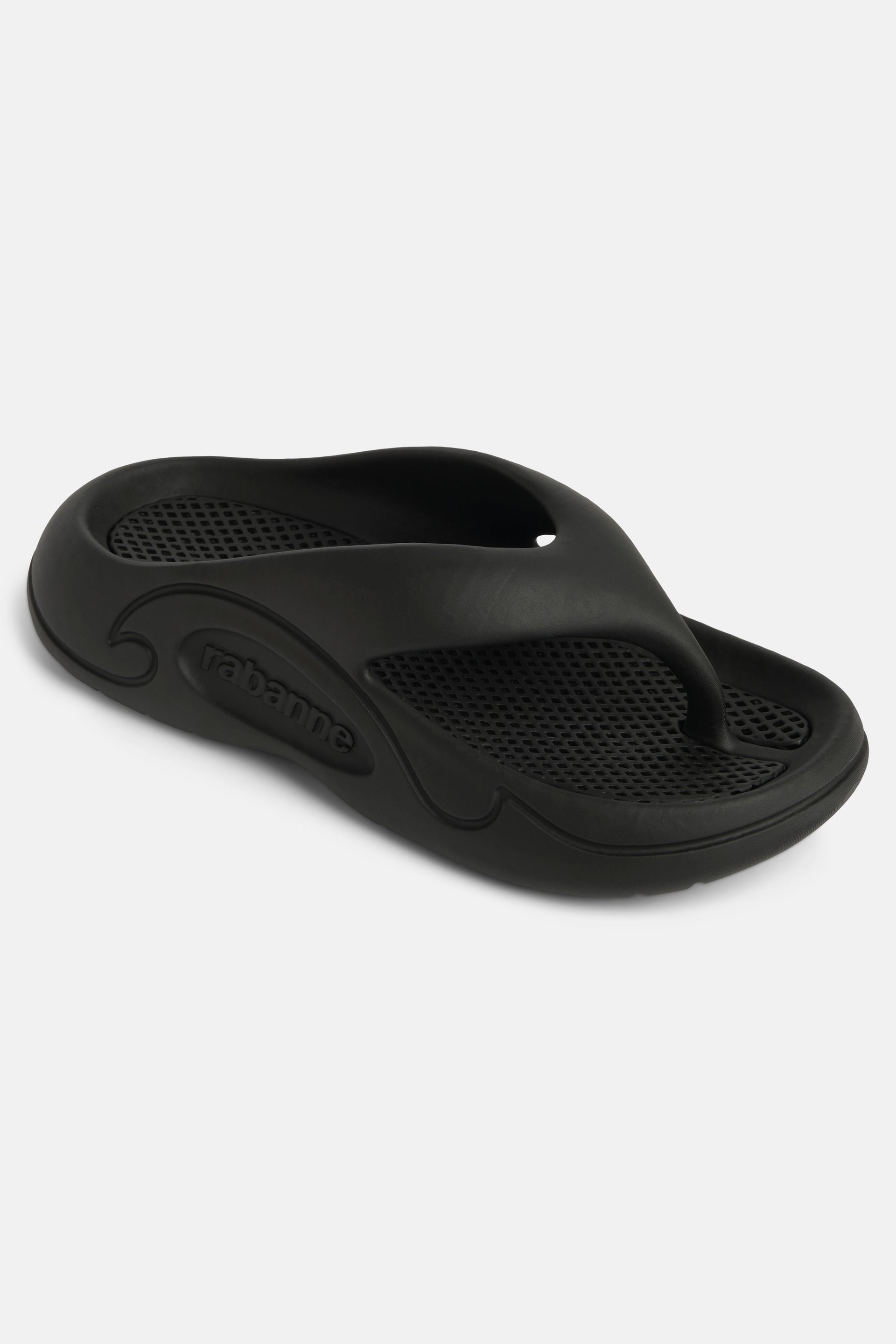 Flat sandals in black rubber