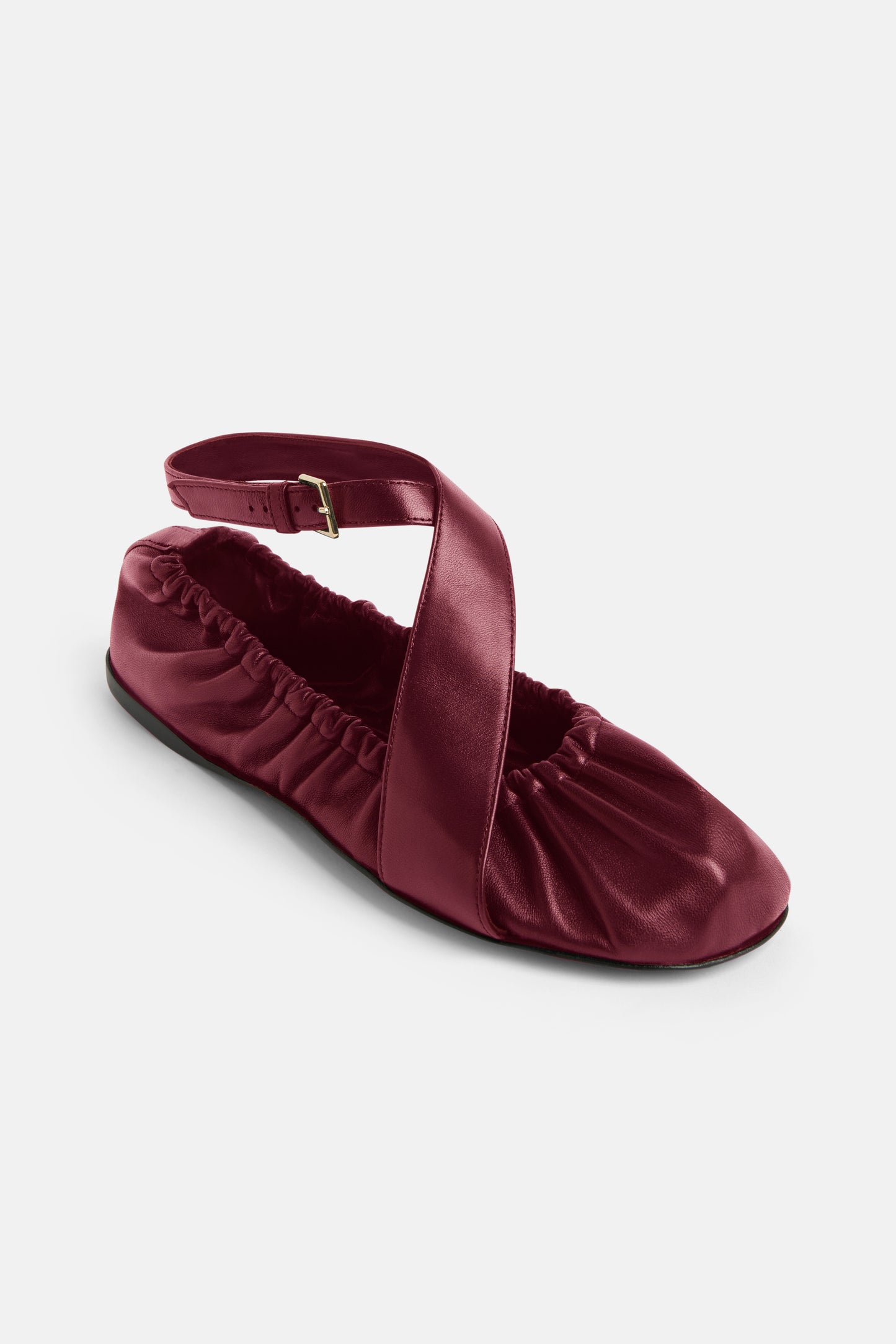 Ballerina in red leather with straps