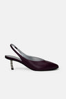 Kitten heel pumps in black leather with silver jeweled heel
