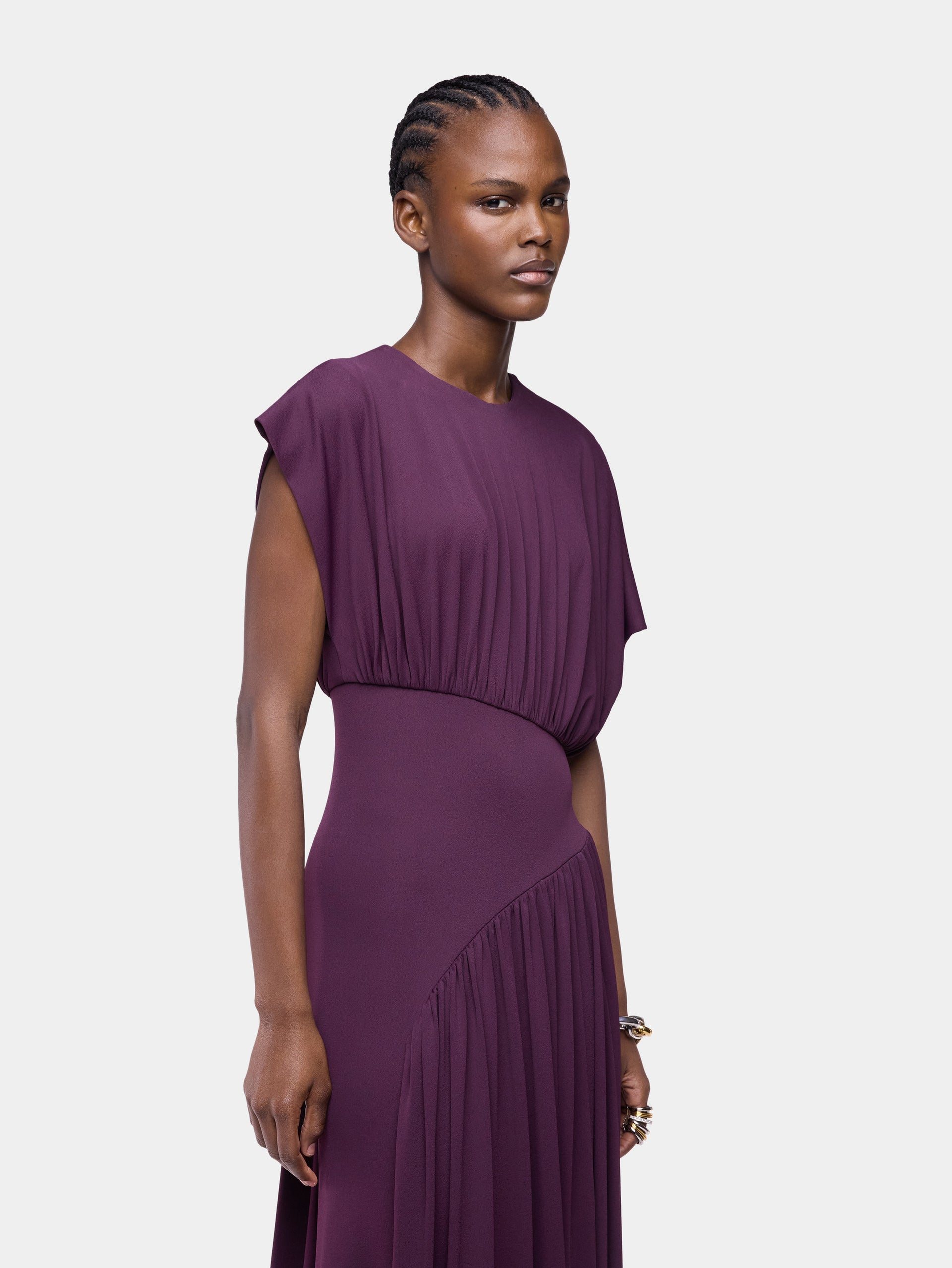 Long magenta asymmetrical dress with ruched details