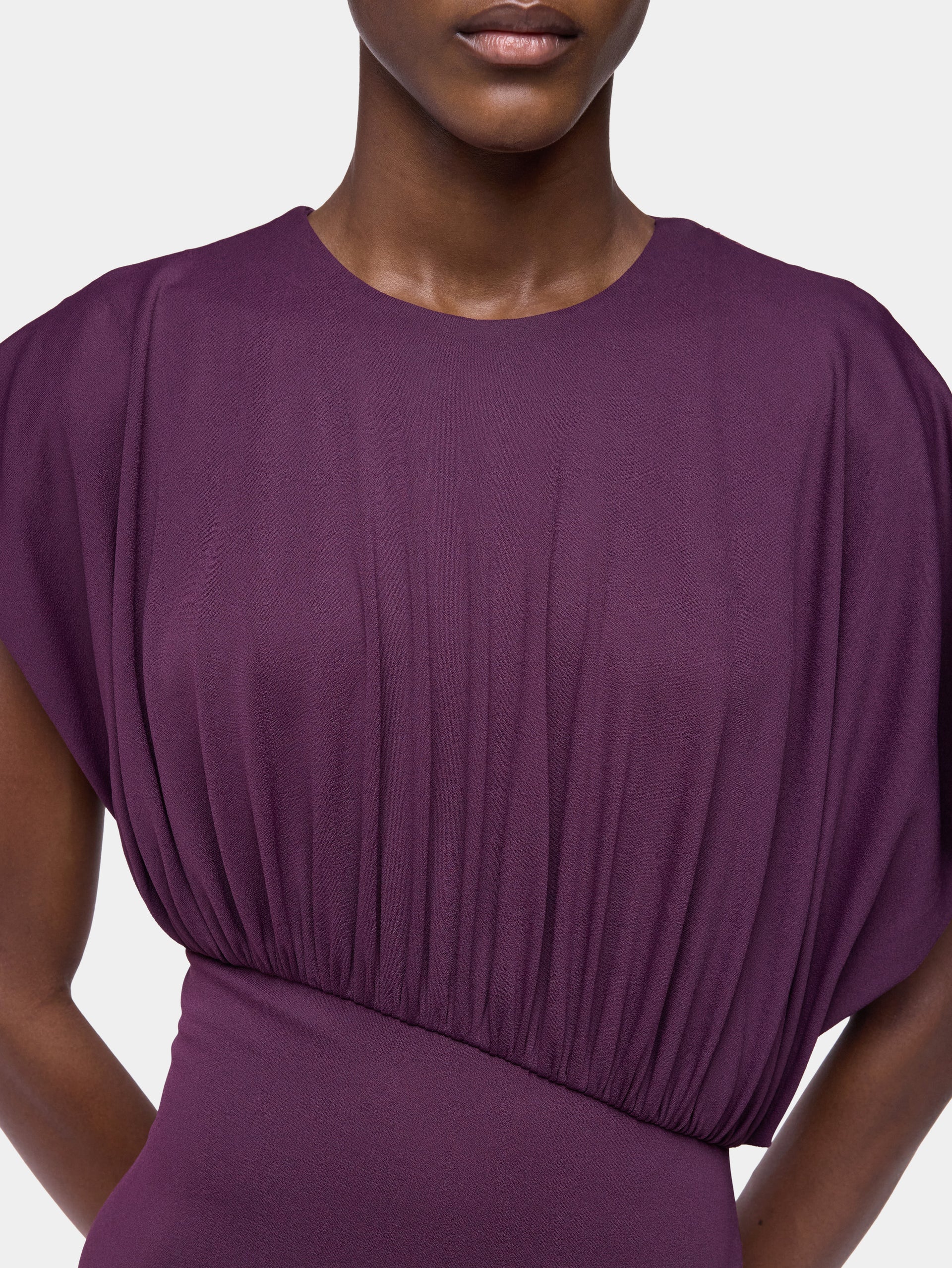 Long magenta asymmetrical dress with ruched details