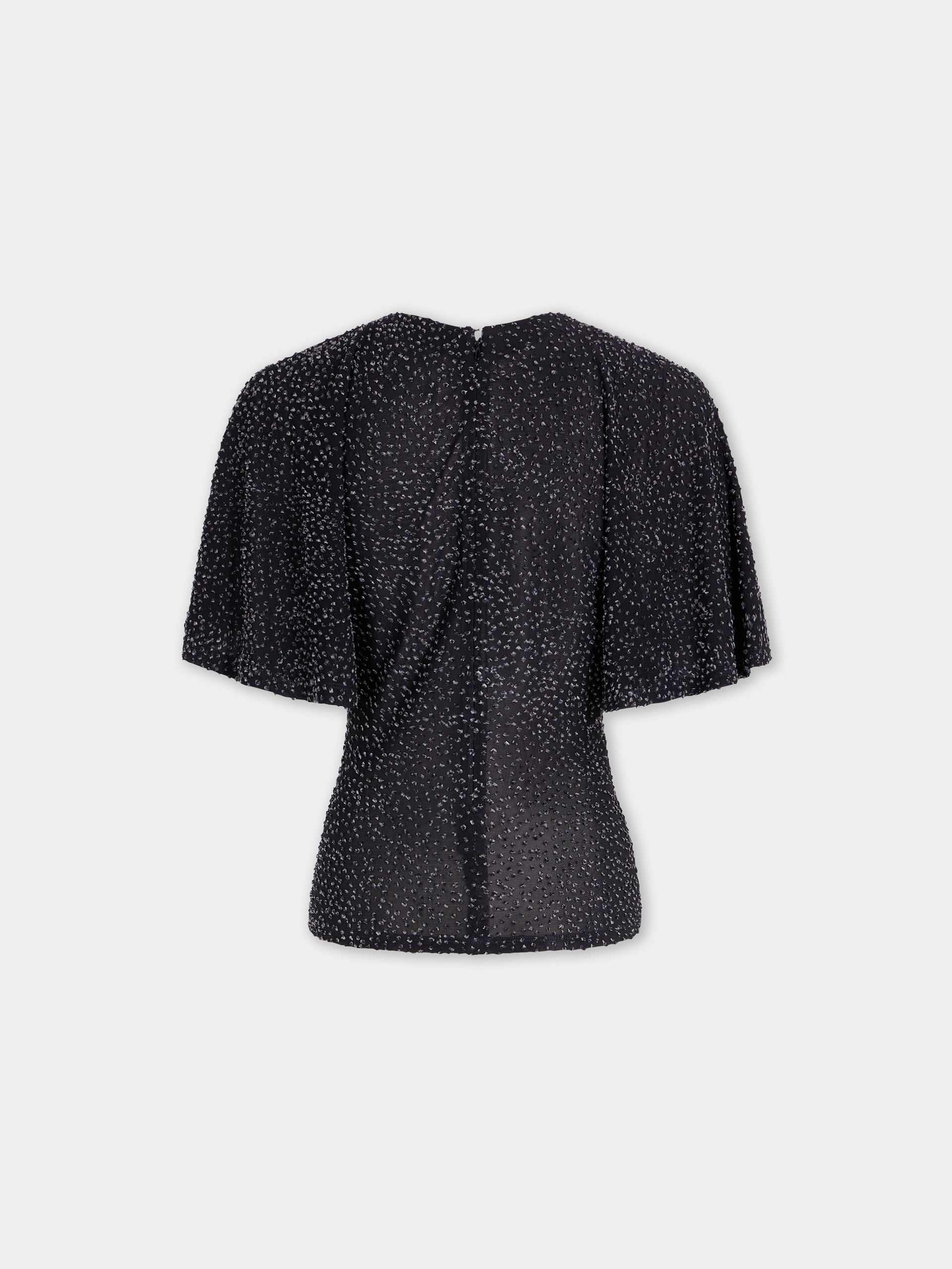 Textured asymmetrical black top with ruched details