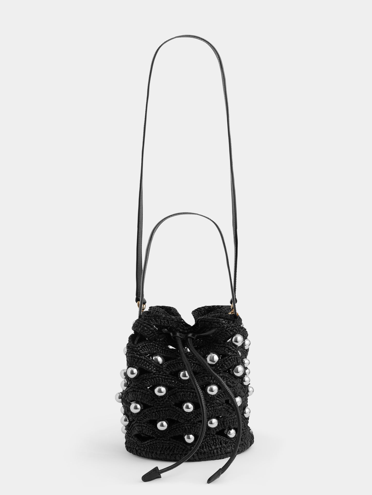 Small bucket bag in black raffia with silver pearls details