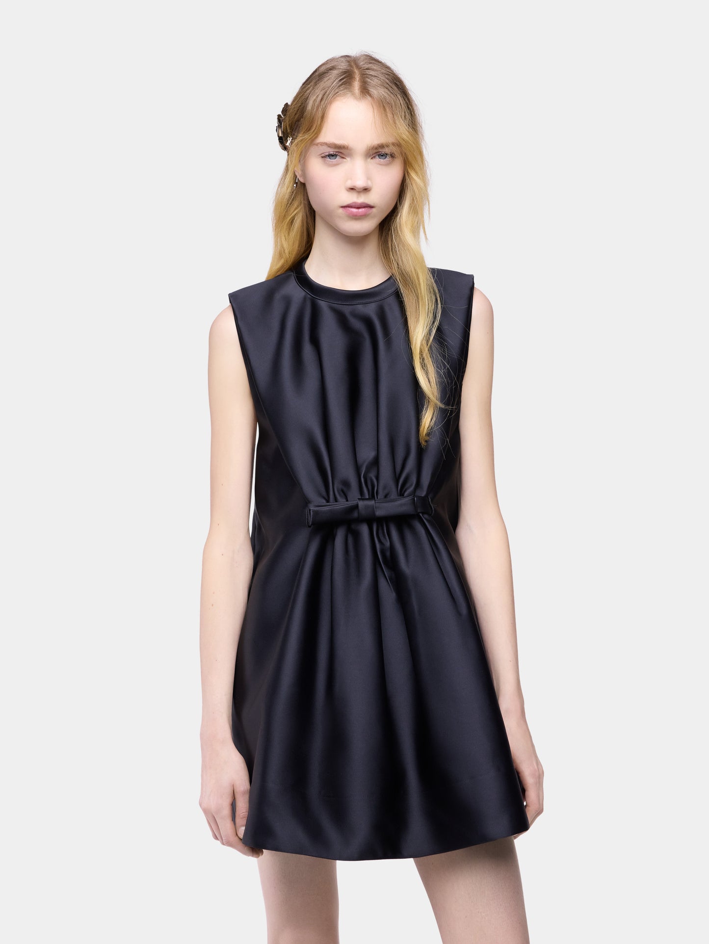 Tailored mini dress in black satin with bow detail