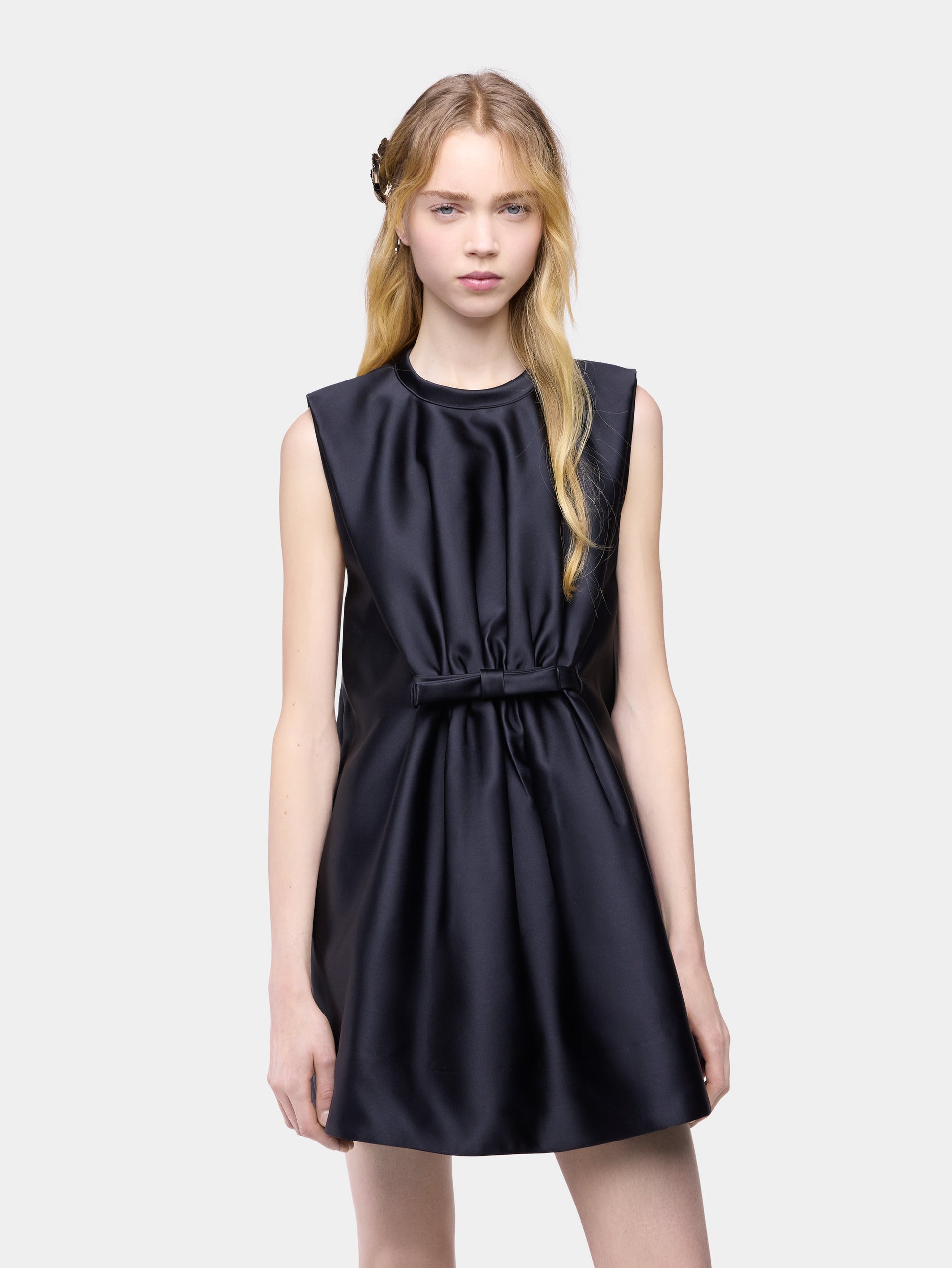 Tailored mini dress in black satin with bow detail
