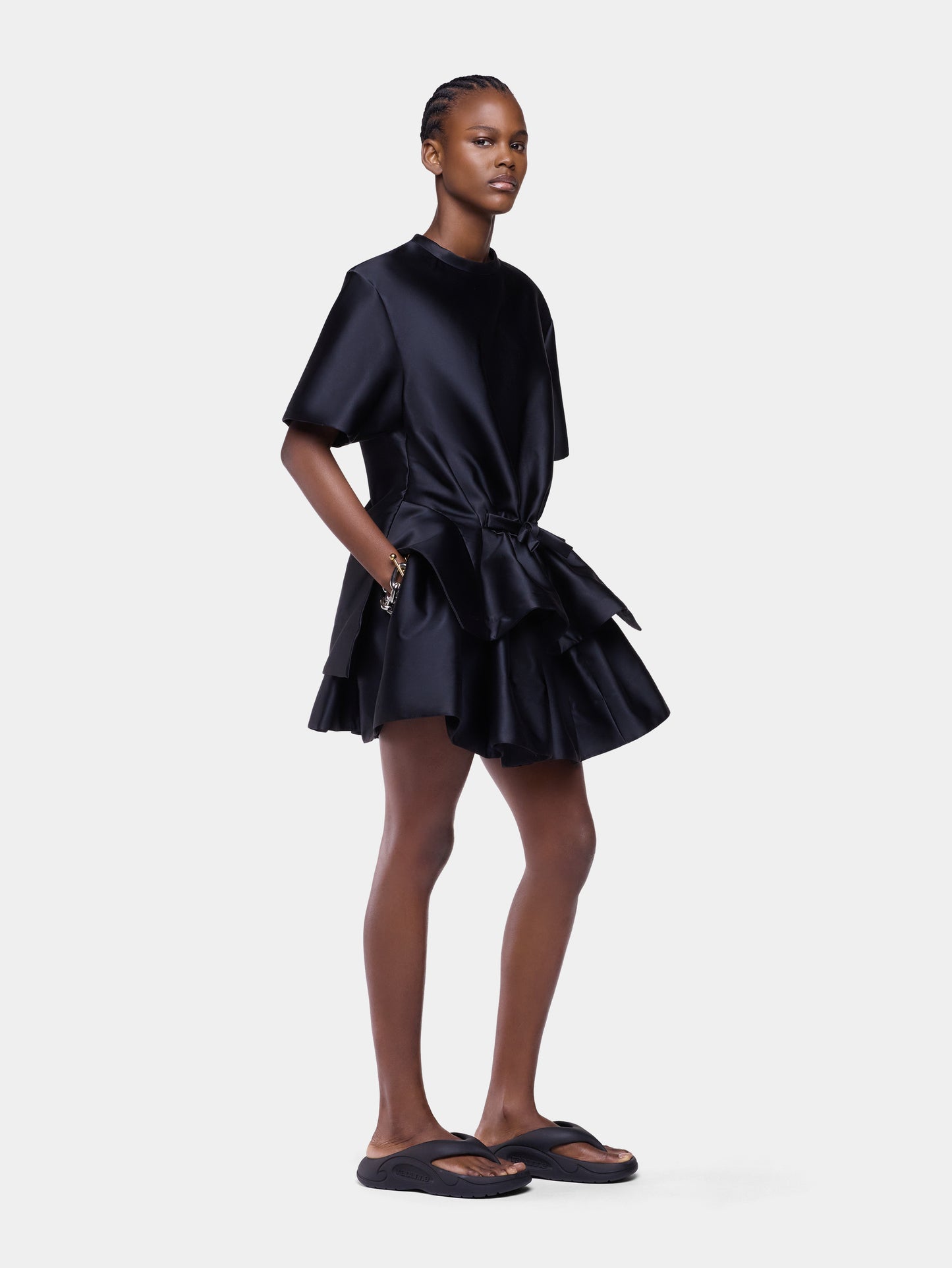 Tailored top in black satin with bow detail