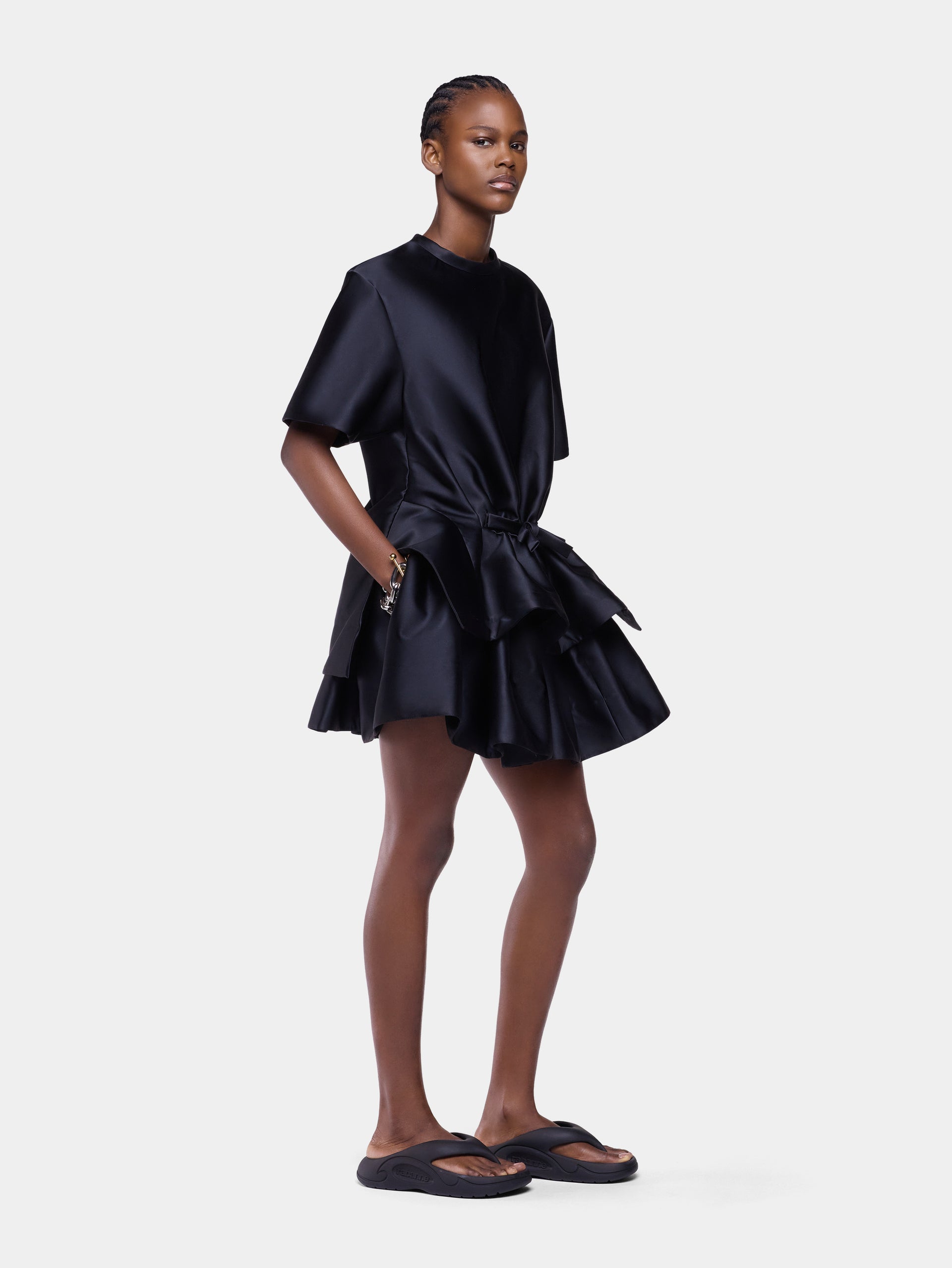 Tailored top in black satin with bow detail