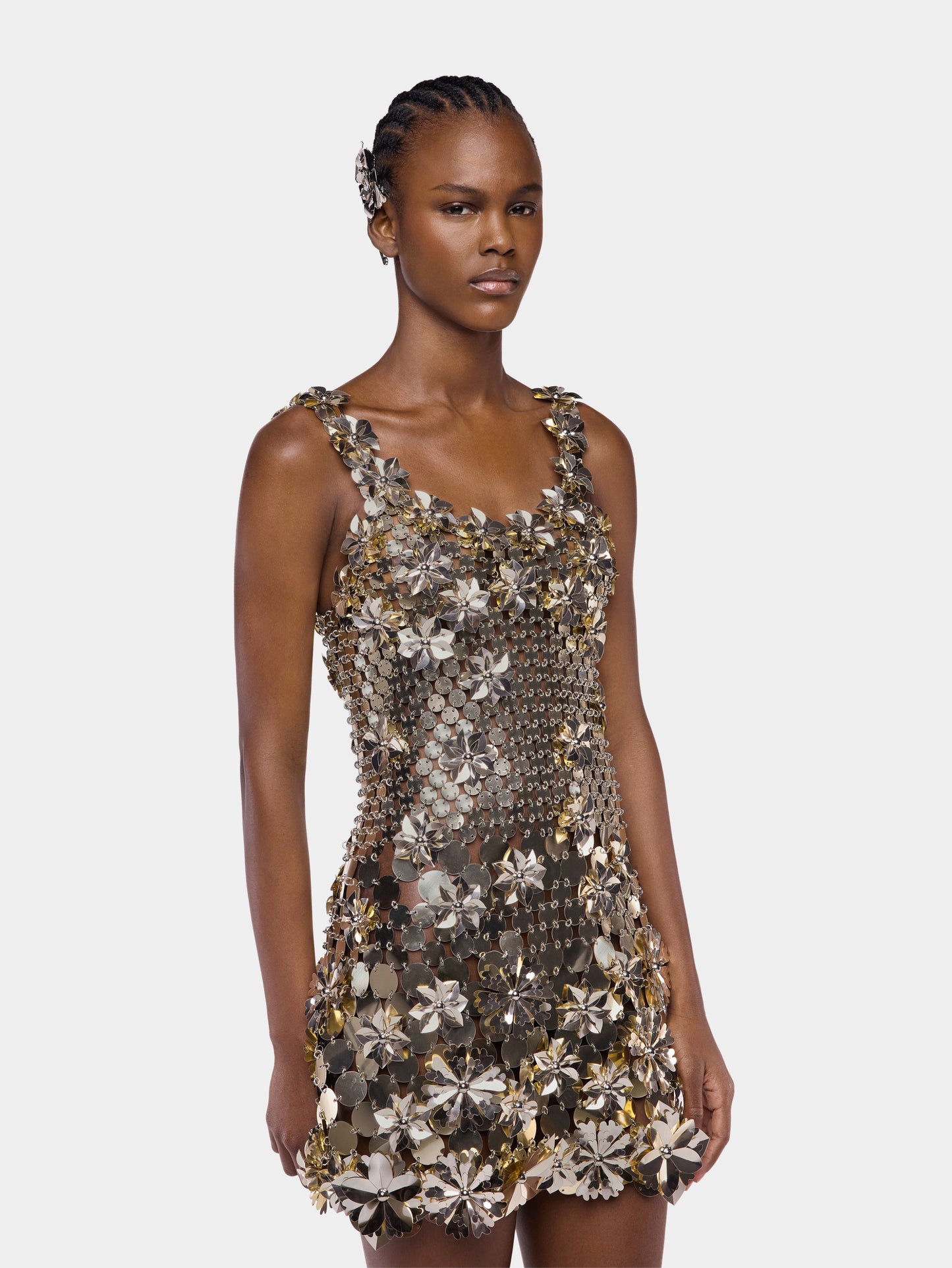 Mini dress in bi-color assemblage with flower details