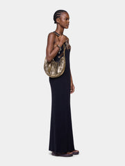 Moon Hobo Flip Bag in reversible black and gold leather position 6