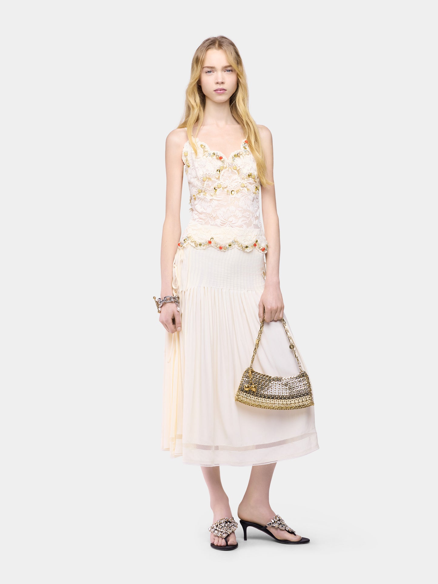 Sleeveless top in off white hand embroidered lace