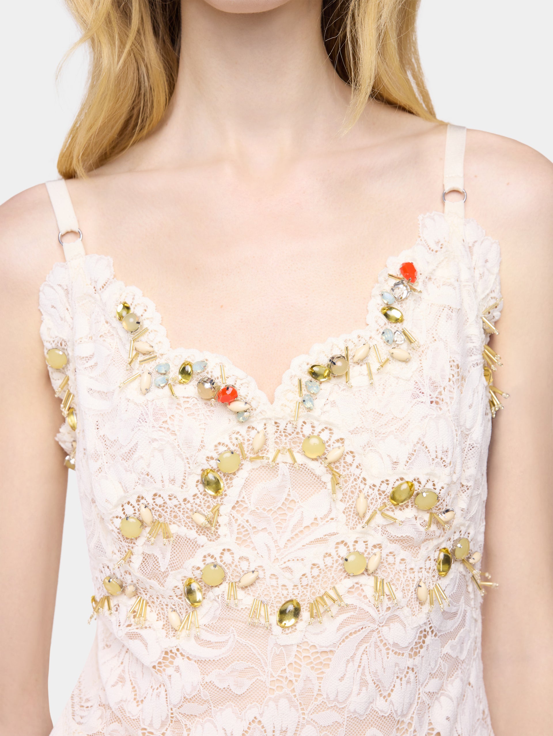 Sleeveless top in off white hand embroidered lace