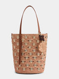 Grand sac seau en raphia naturel et pêche avec disques signature 1969 en métal doré