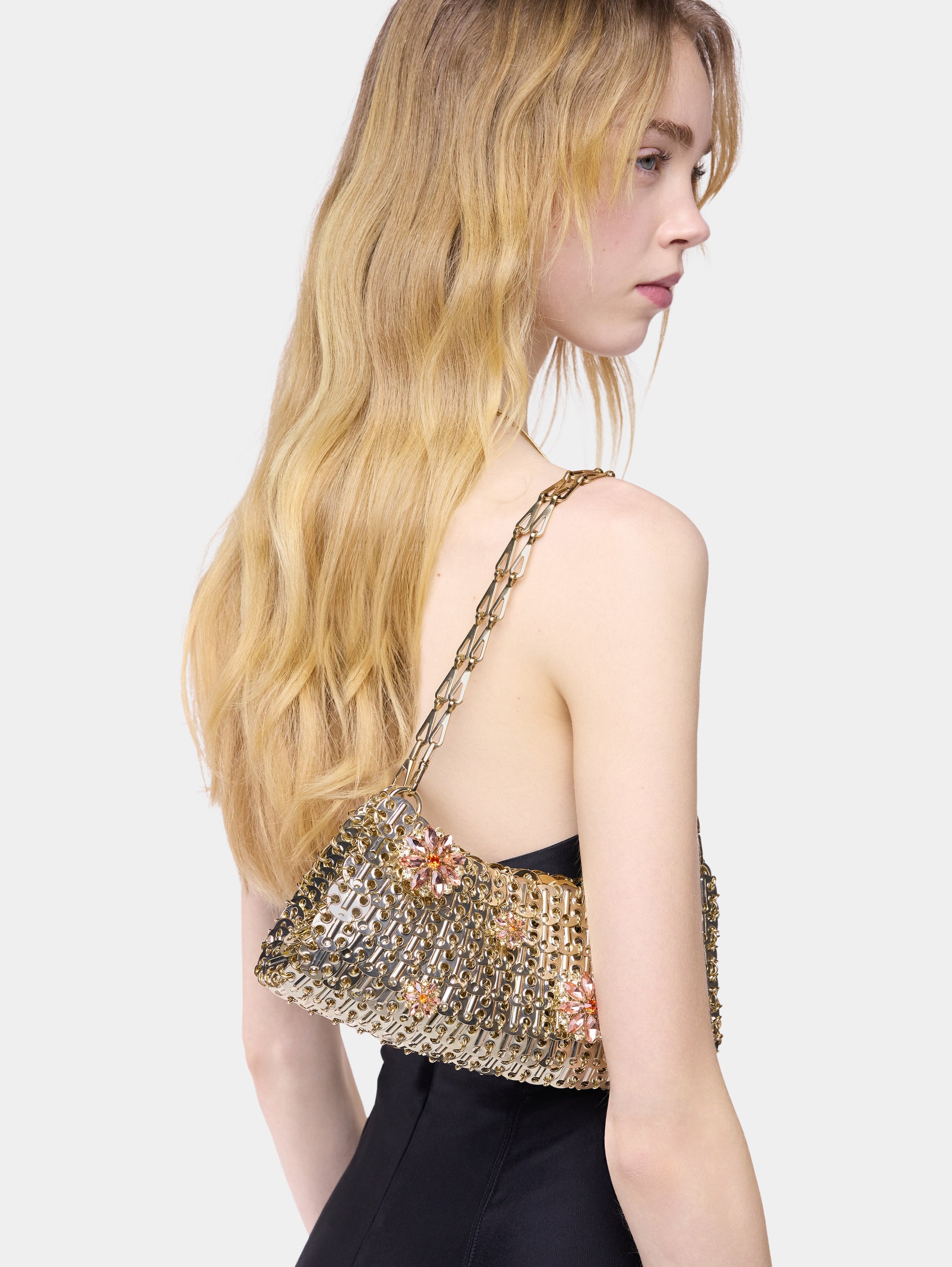 1969 clutch bag in gold metal with pink strass flower details.