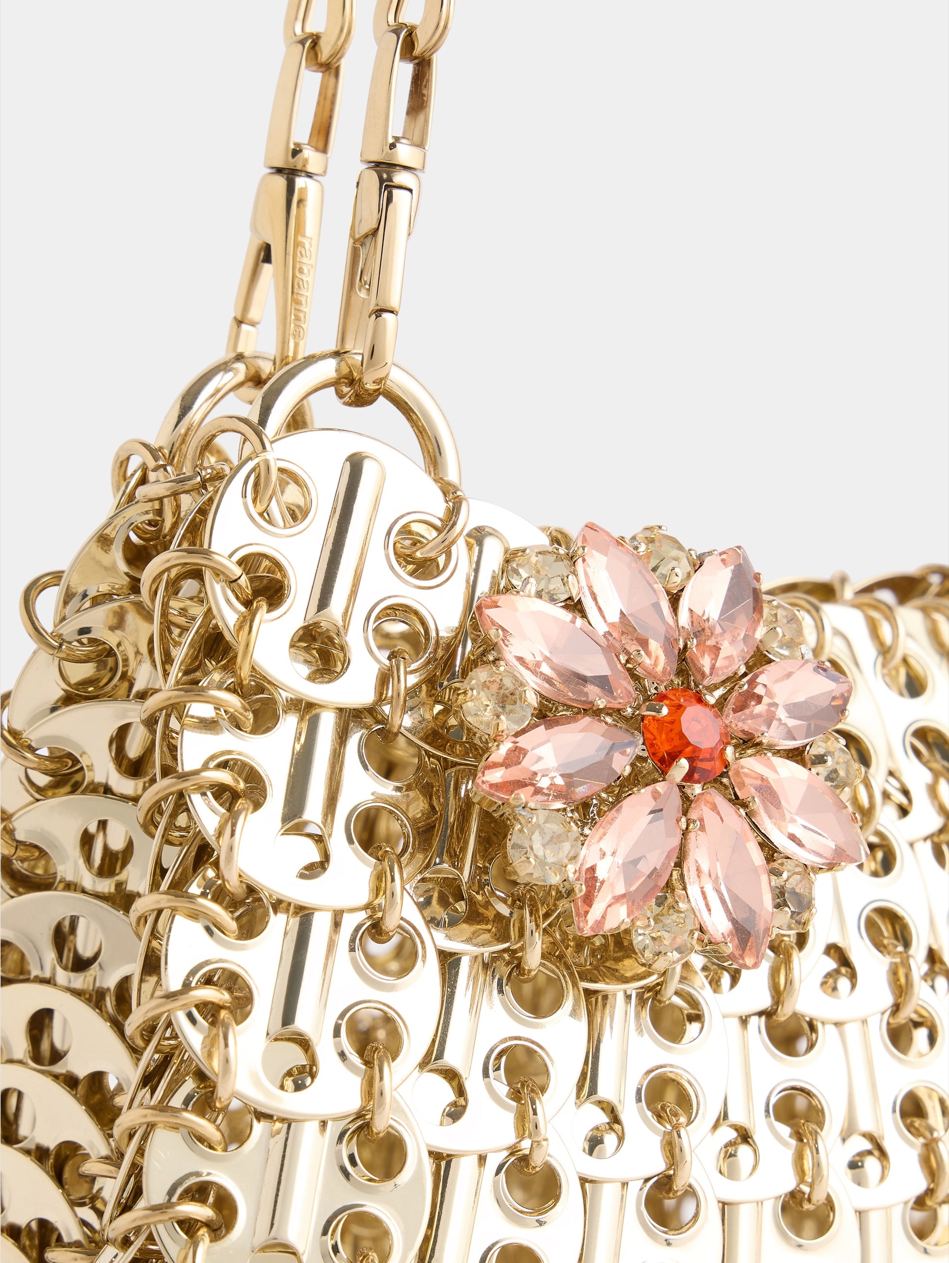 1969 clutch bag in gold metal with pink strass flower details.
